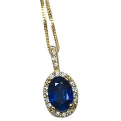 Ceylon 1.00 Carat Blue Sapphire and Diamond 18 Karat Gold Cluster/Halo Pendant