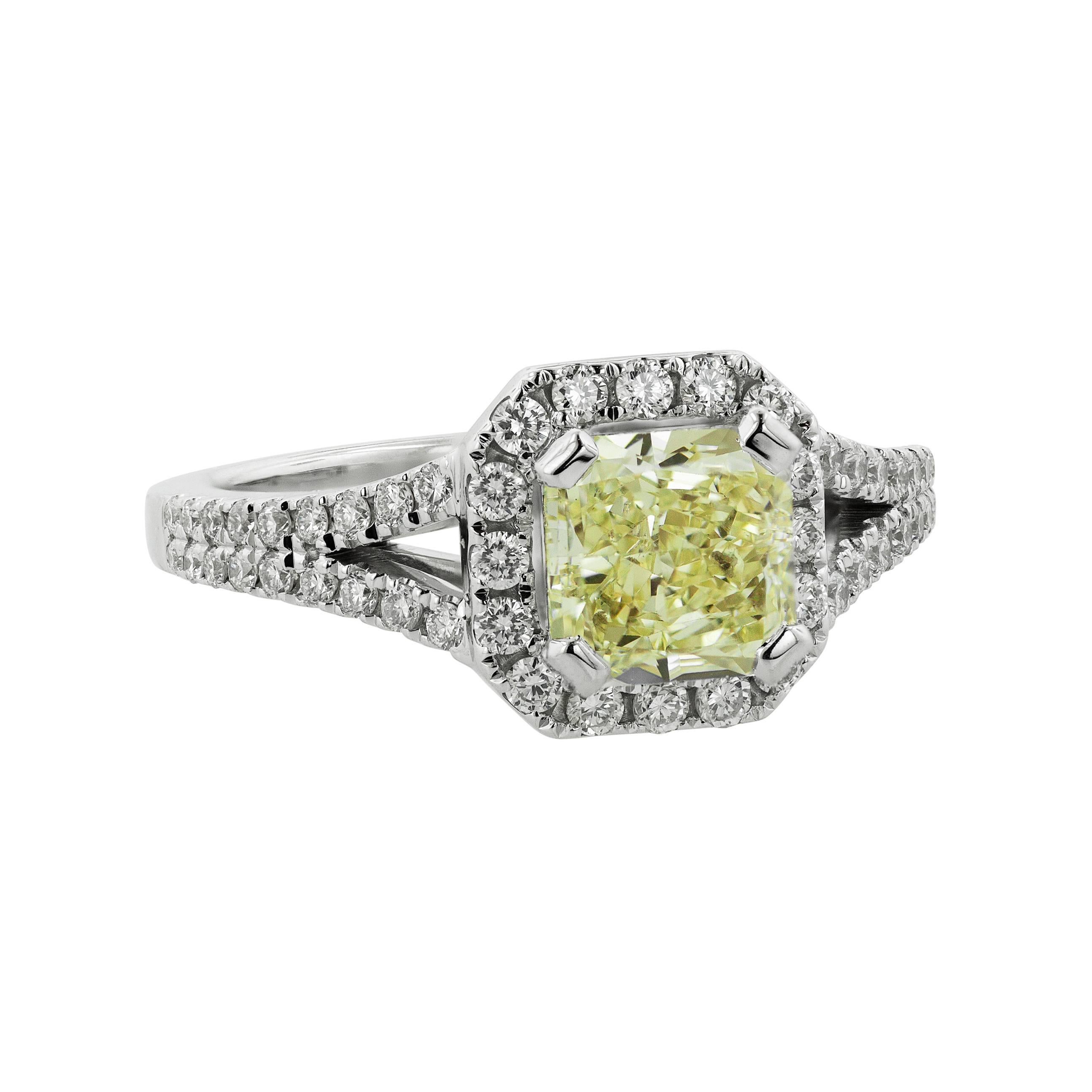 GIA Certified 2.11 Carat Yellow Diamond Halo Engagement Ring 18 Karat White Gold For Sale