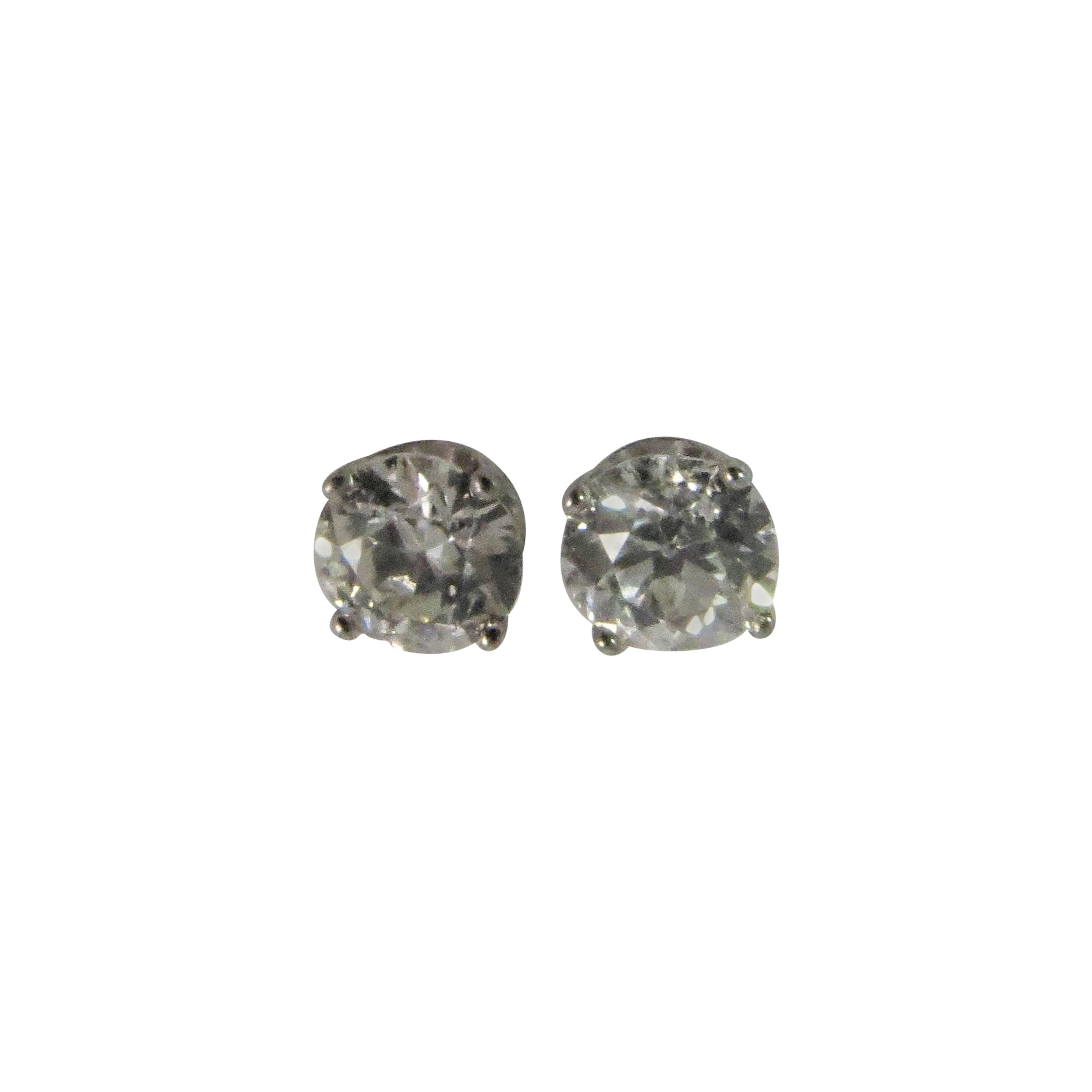 European Cut Diamond Stud Earrings Set In Platinum Four Prong Settings