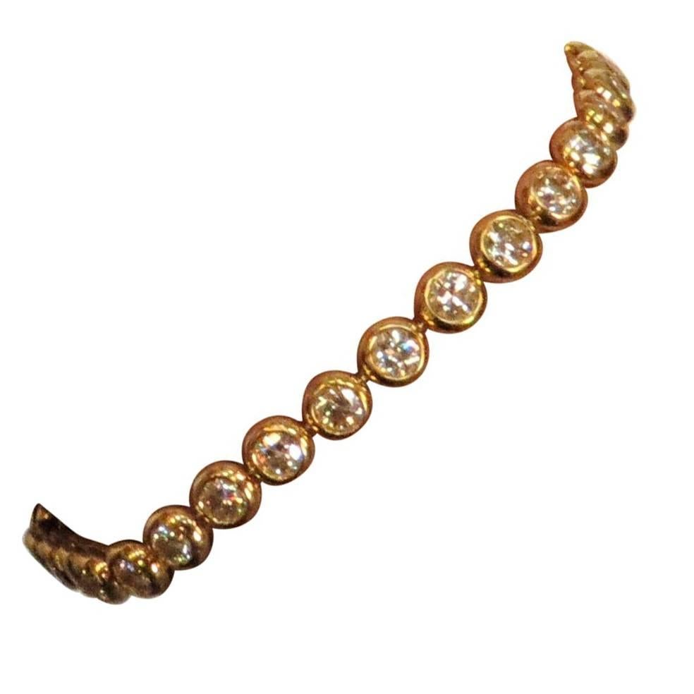 18 Karat Yellow Gold Bezel Set Diamond Tennis Bracelet