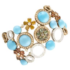 Diamonds, Sapphires, Turquoise, 14 Karat Rose and White  Gold  Bracelet.