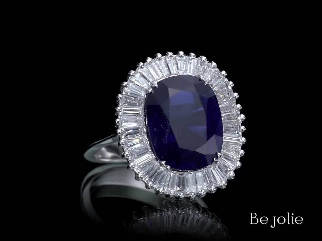 One of a Kind Ballerina Style Sapphire and diamonds ring starring 6.97 Carat natural blue sapphire. Our stunning Cushion Cut Sapphire surrounds with 36 Baguette cut diamonds 1.47 Carat TDW E-G VS. 
Jewel Details: 
6.97 Carat Cushion cut Blue