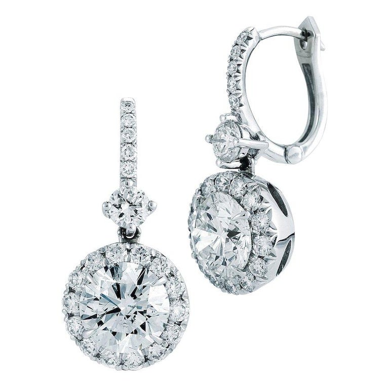 1 37 Carat Dangling Halo Diamond Earrings In 18 Karat White Gold For 1 37 Carat Dangling Halo Diamond Earrings In 18 Karat White Gold For