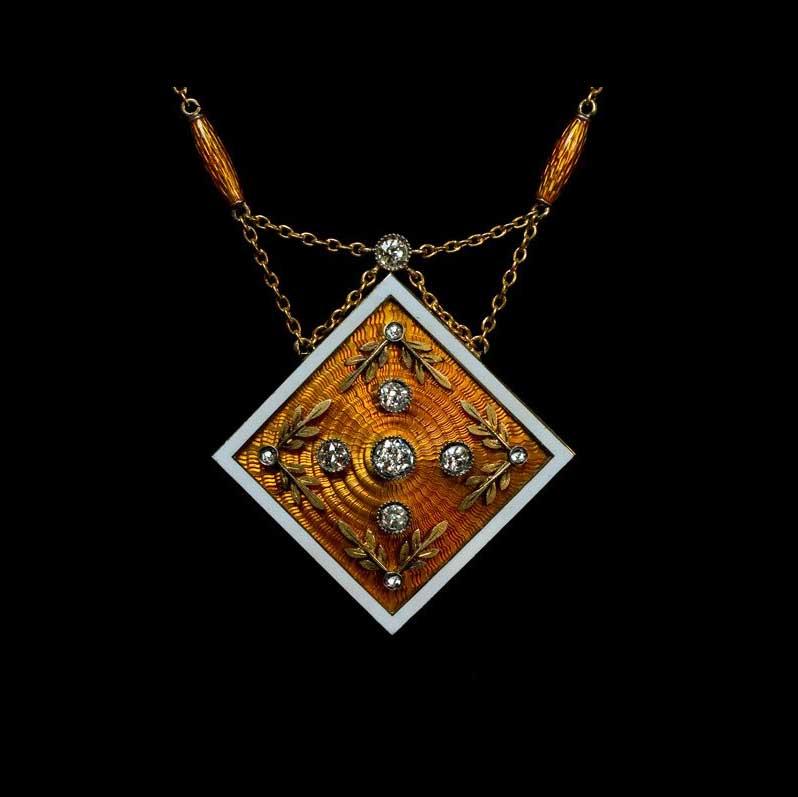 A magnificent antique Russian guilloche enamel, silver, gold, and diamond locket necklace. Attributed to Faberge. The interior is fitted with two glazed miniature picture frames. The reverse of the front guilloche enameled plaque is struck with 88