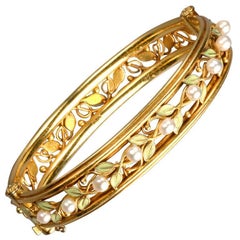 Arts and Crafts Enamel Pearl 18k Gold Bangle Bracelet, circa 1910