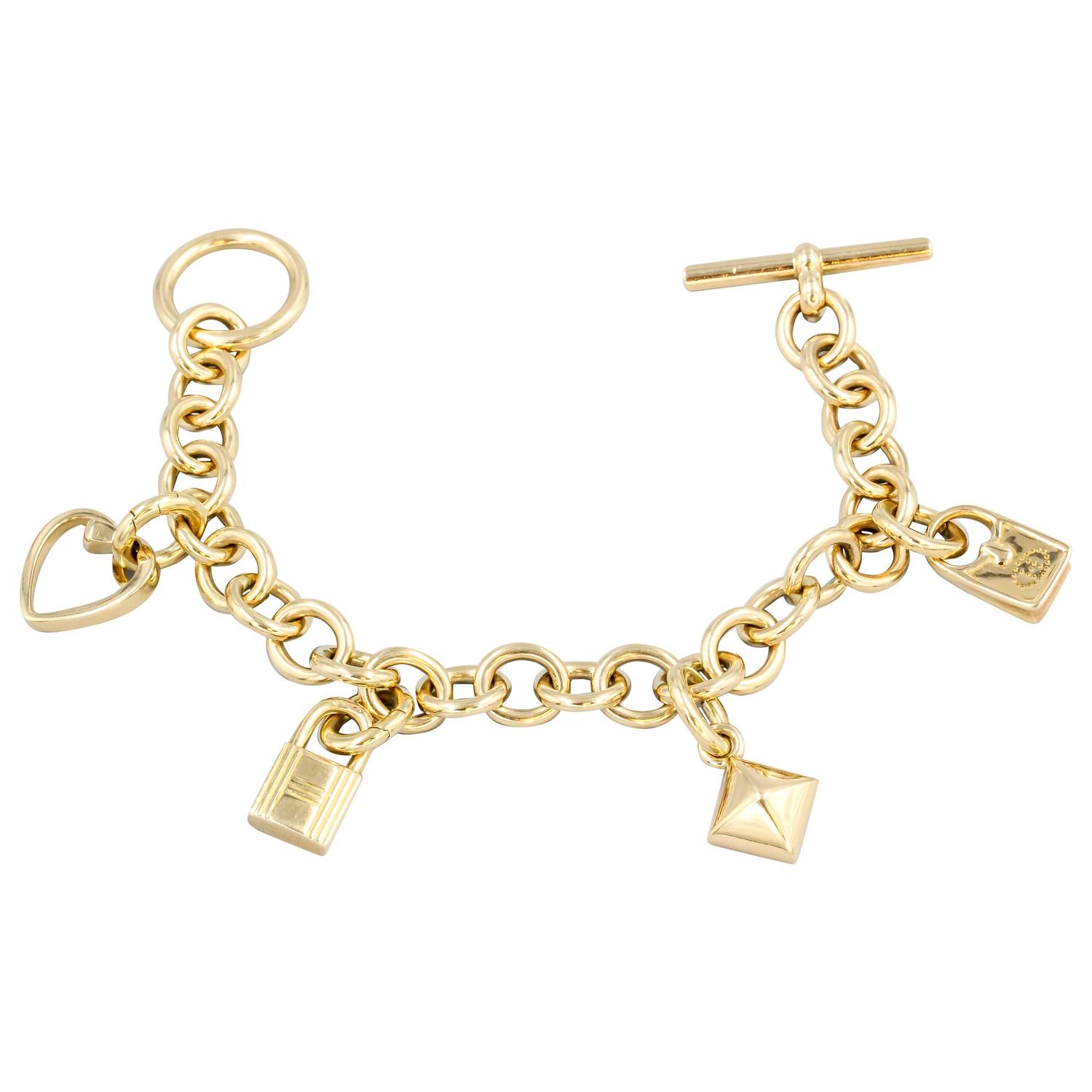 Hermes Gold Charm Bracelet For Sale at 1stdibs