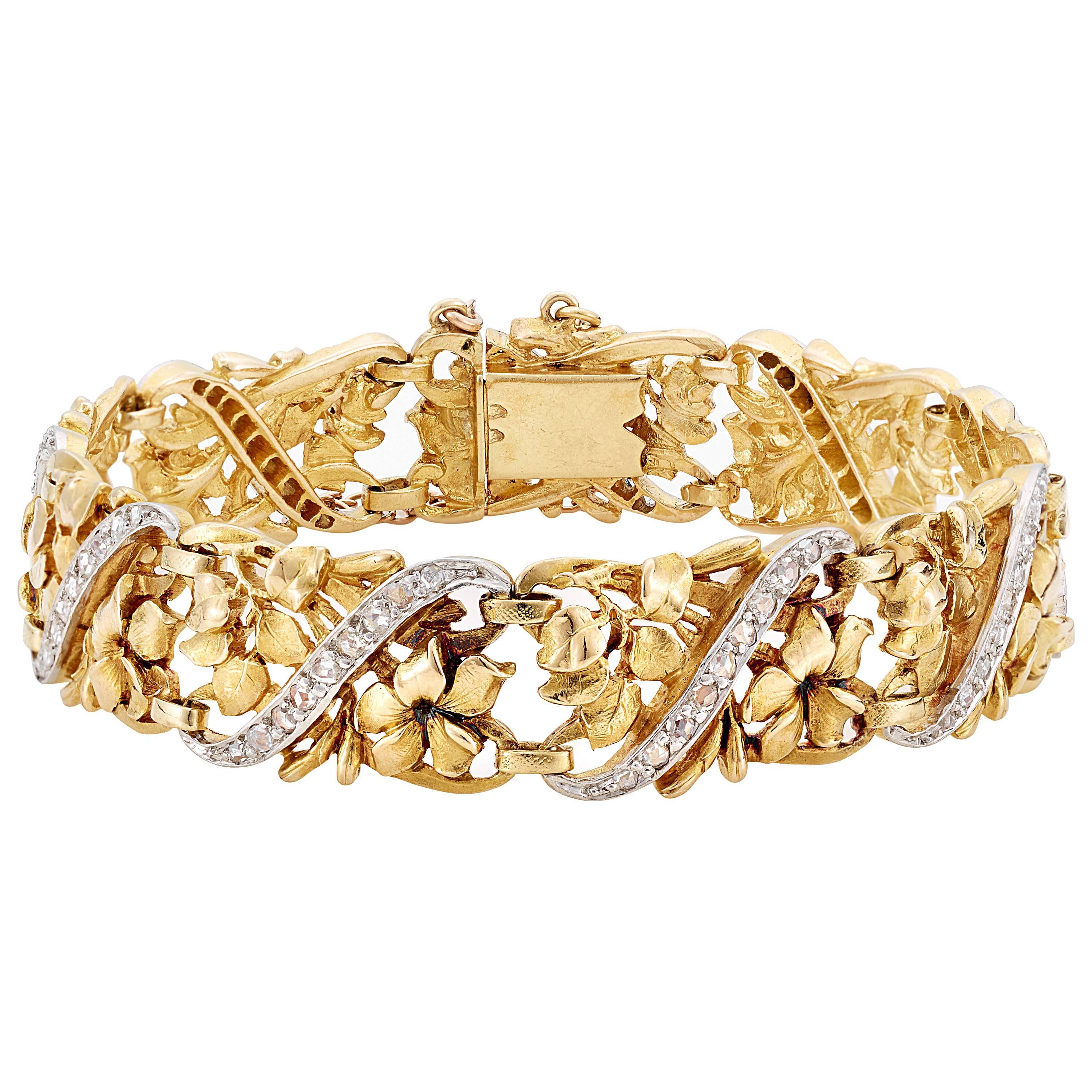 Bracelet plaque ajouré à fleurs en or 18 carats et platine Belle poque avec diamants