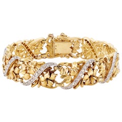 Antique Belle Époque 18K Gold and Platinum Floral Openwork Plaque Bracelet with Diamonds