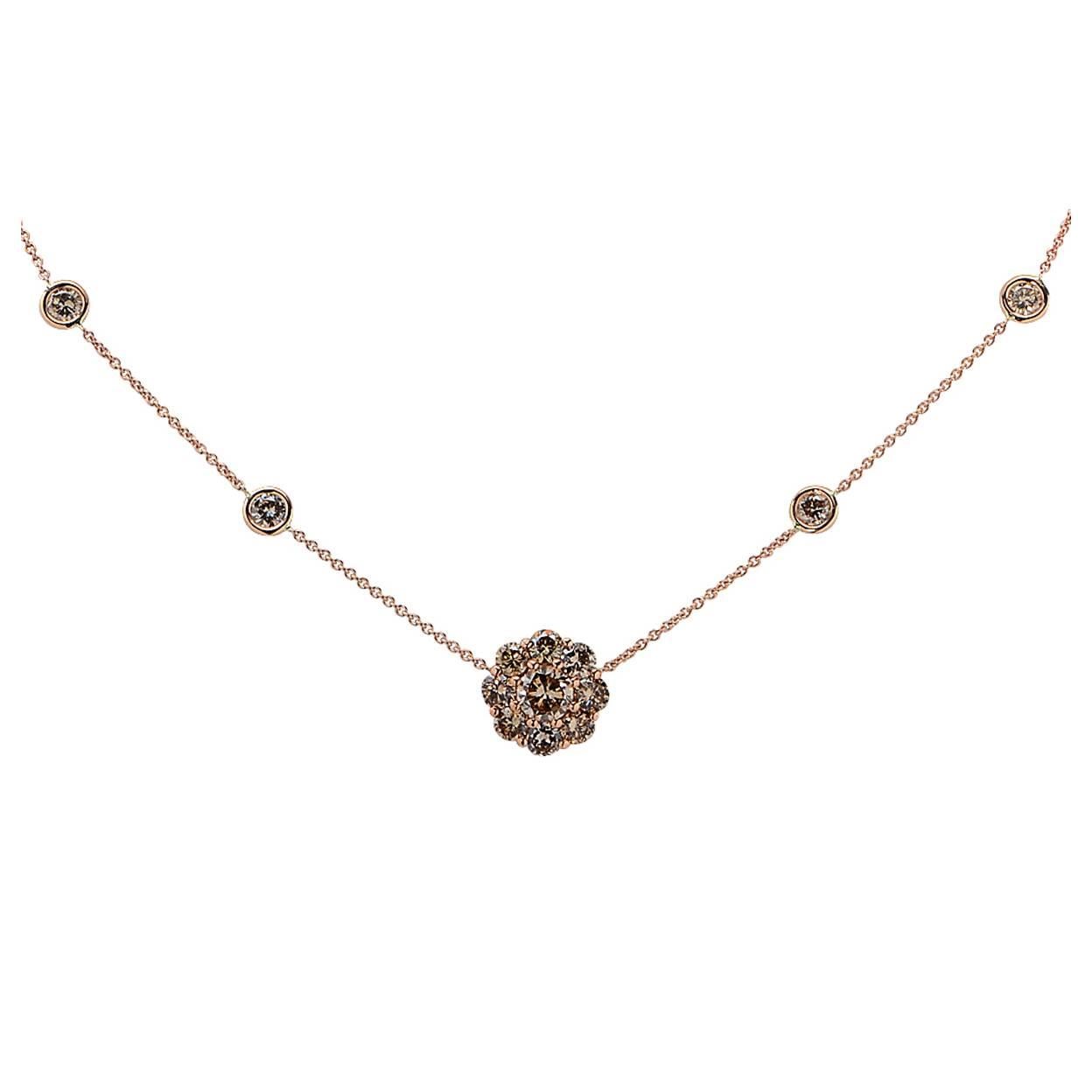 18 Karat Rose Gold Necklace Featuring a Fancy Brown Round Brilliant Cut Diamond Weighing 1.19ct Surrounded by 2.47cts of Fancy Brown Round Brilliant Cut Diamonds.
