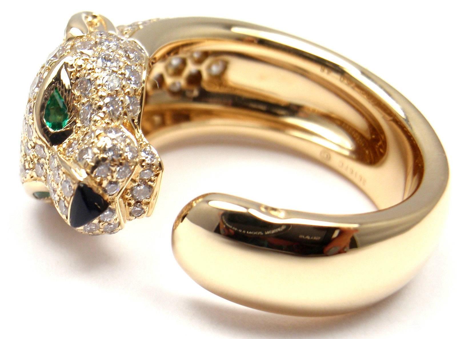 18k Yellow Gold Diamond, Emerald, and Onyx Panther Ring by Cartier. 
Part of the 