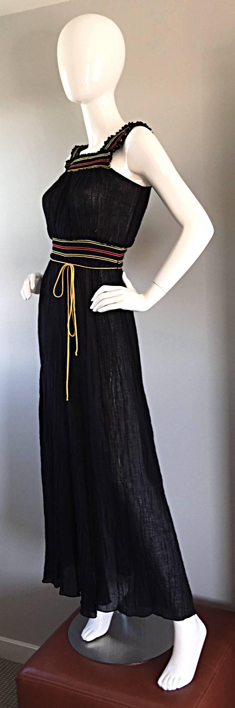 The perfect maxi dress, by Miguelina, for Bergdorf Goodman! Black airy cotton, with strips of burnt orange and yellow, and yellow tie belt at waist. Elastic at bust, and at waist, so can fit a variety of sizes. Super flattering, and extremely