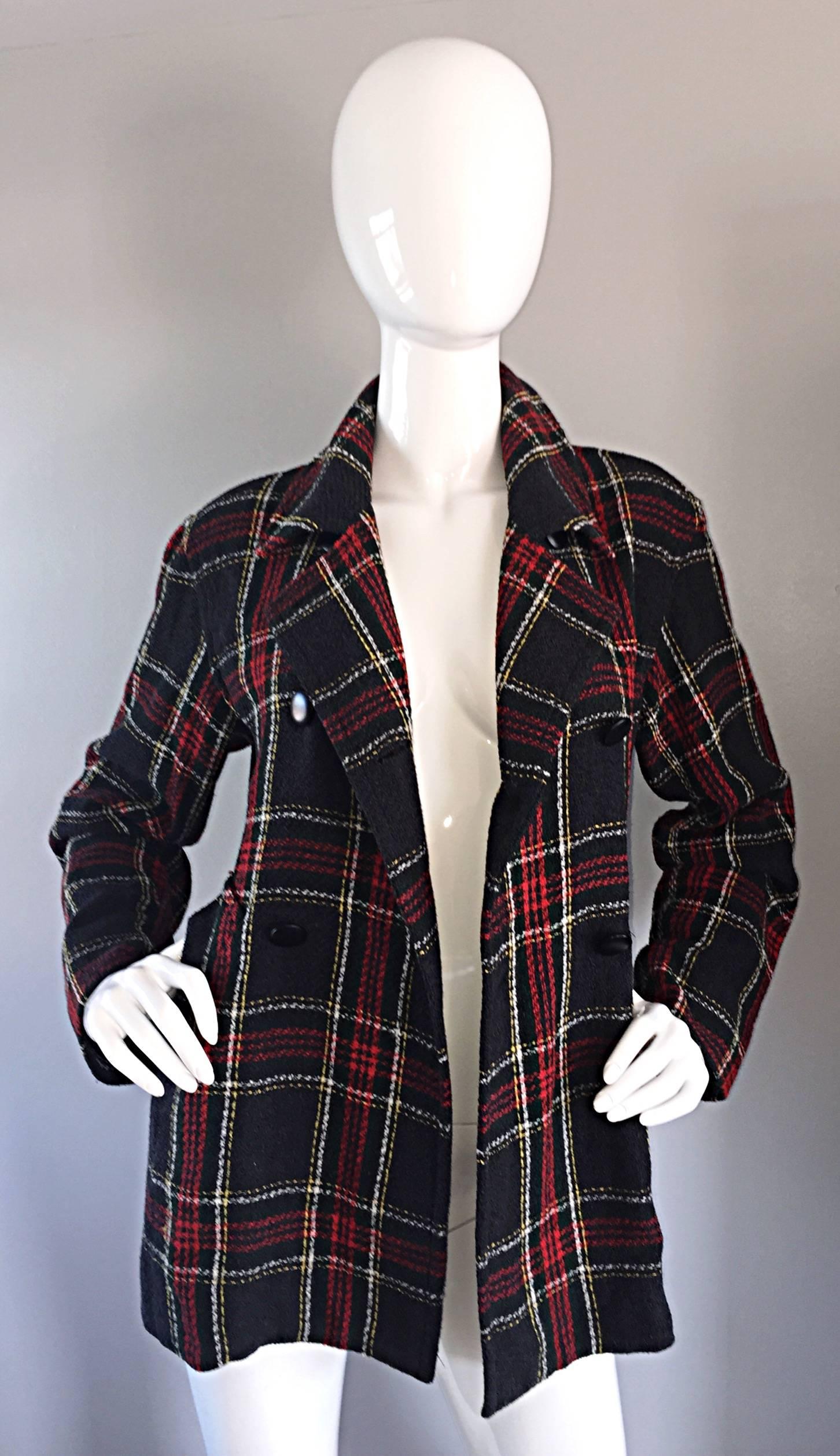 Chic vintage Isaac Mizrahi for Bergdorf Goodman tartan plaid swing jacket! Classic style, with colors of red, dark greens, and white. Double breasted style, with self belt in the back. Pockets at both sides of the waist. Great flattering fit! Looks