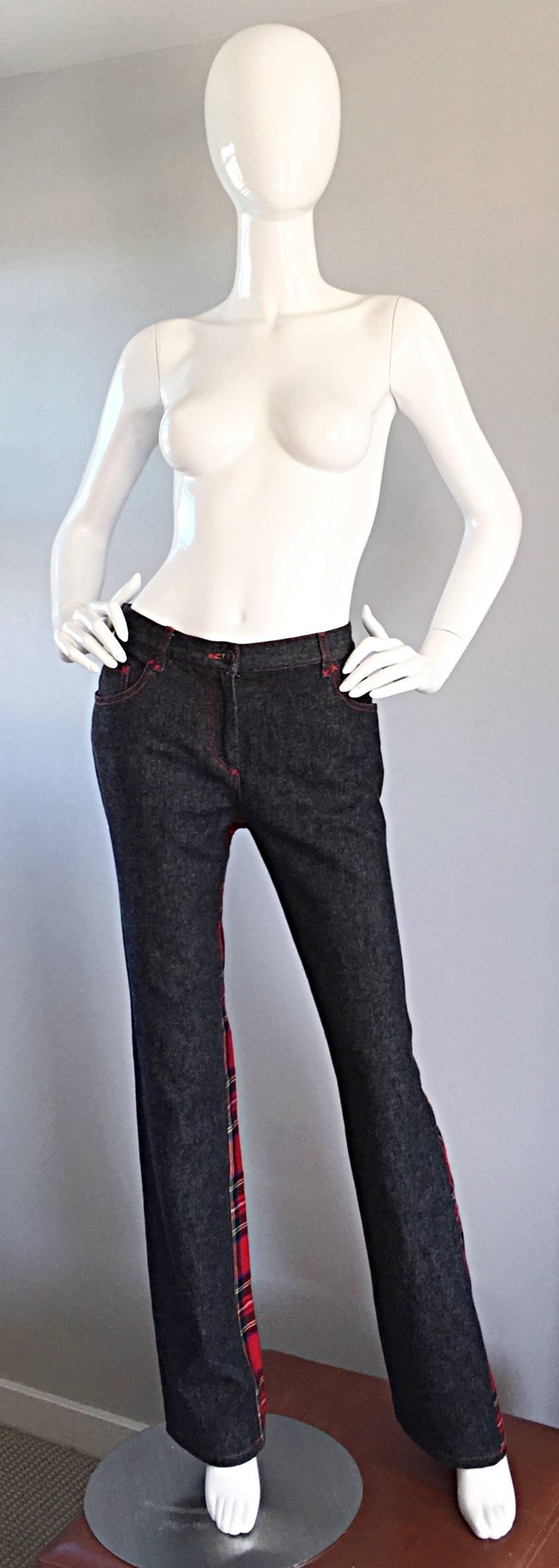 Rare, and incredible Dolce & Gabbana boot cut denim trousers, with a twist! Grey/black denim in the front, with a chic red tartan plaid wool back. Slimming, and flattering boot cut fit, with pockets at both sides of waist, and two in the rear. Can