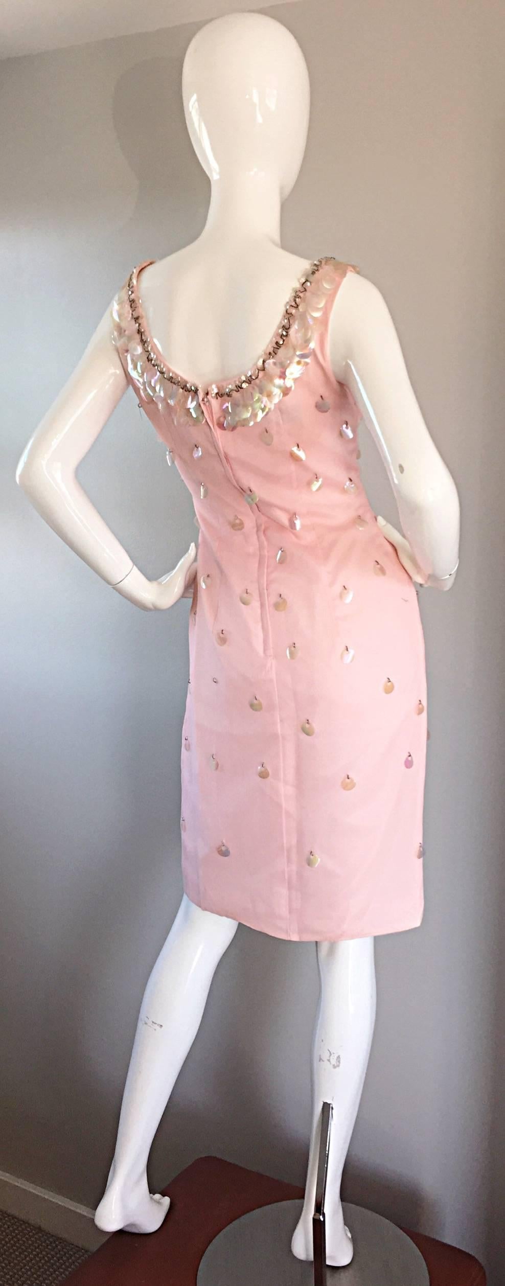 Sensational 1960s Lilli Diamond light pink chiffon dress, with pailletes, beads, and sequins embellished throughout. Brand new, with original store tags, this deadstock dress is simply divine in person! Beaded collar, with full metal zipper up the