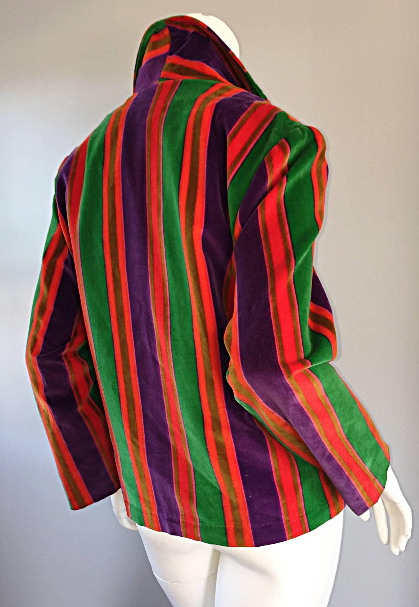 Wonderful vintage 1970s I. Magnin rainbow striped velvet blazer! A real statement jacket, that can easily be dressed up, or down. Great alone, or belted. Two pockets at each side of the waist. Fully lined. In great condition. Approximately Size