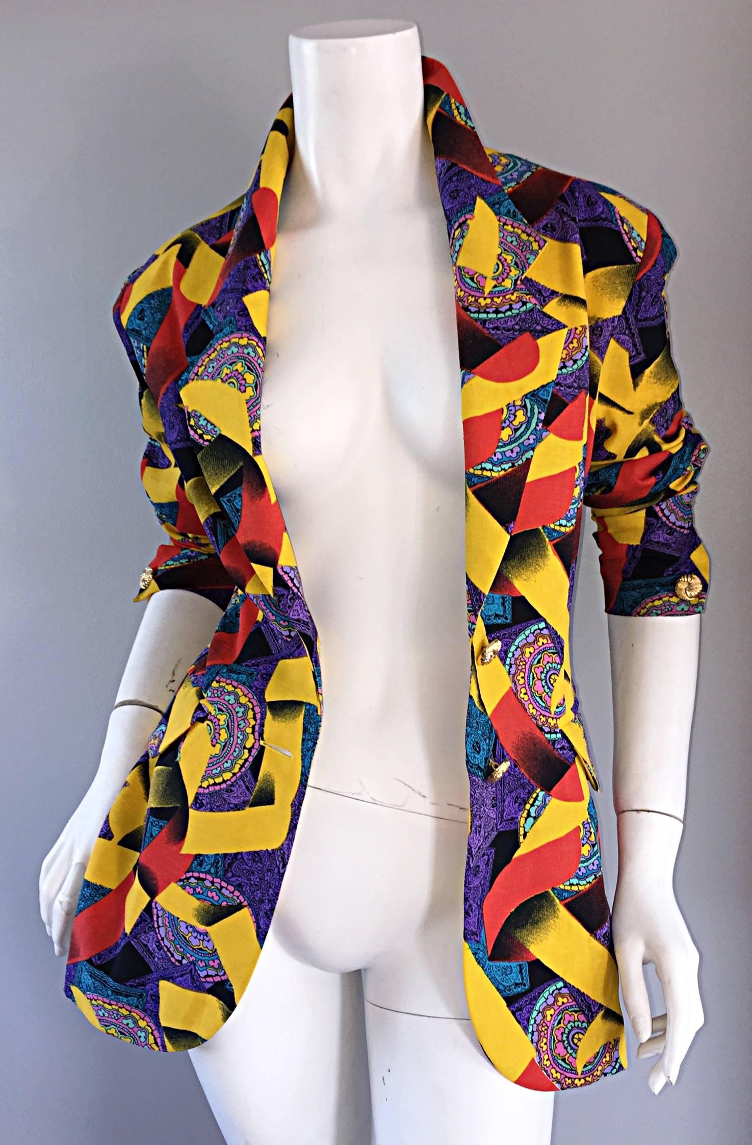 Wonderful vintage Roberto di Cabrini vintage ribbon and paisley print fitted cotton jacket! Features yellow and red ribbon print, amongst a purple, pink and blue paisley print. Gold decorated buttons down the bodice, and at each sleeve cuff. Two