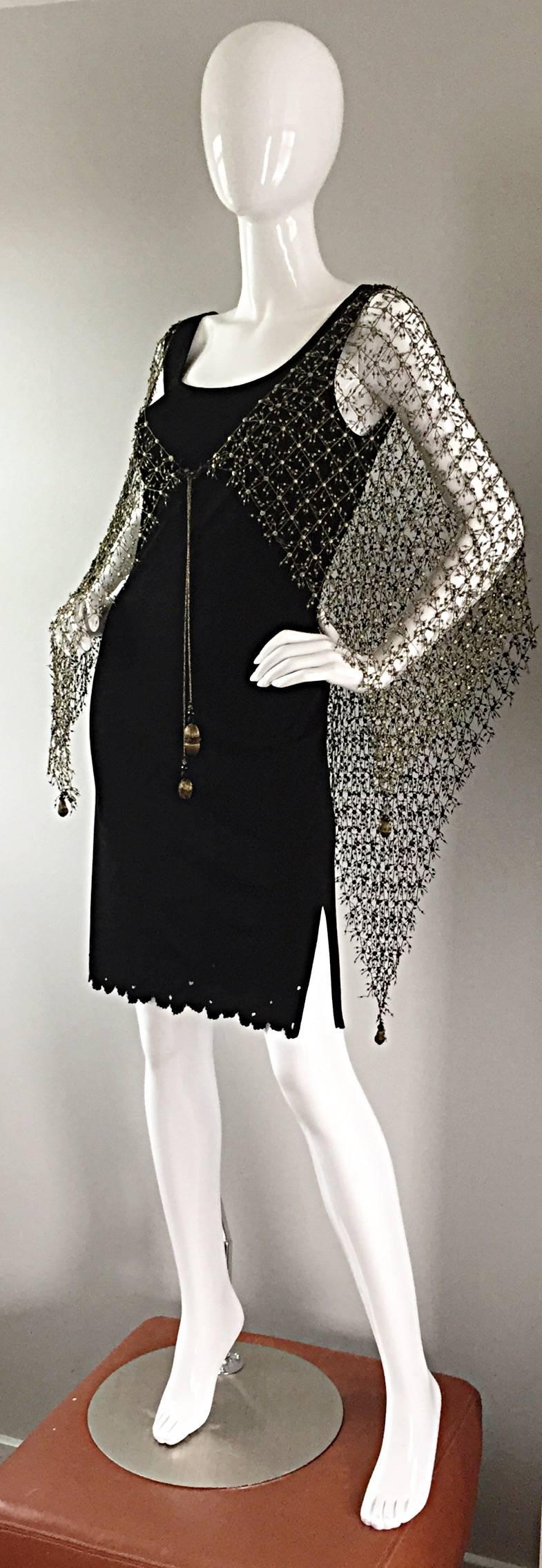 Incredibly rare 1970s / 70s Holly's Harp black silk jersey dress, AND gold silk crochet cape! This could be my favorite Holly's Harp piece...EVER! Dress features cut-outs at hem. Shawl features four tassels in the front, and two in the back, that