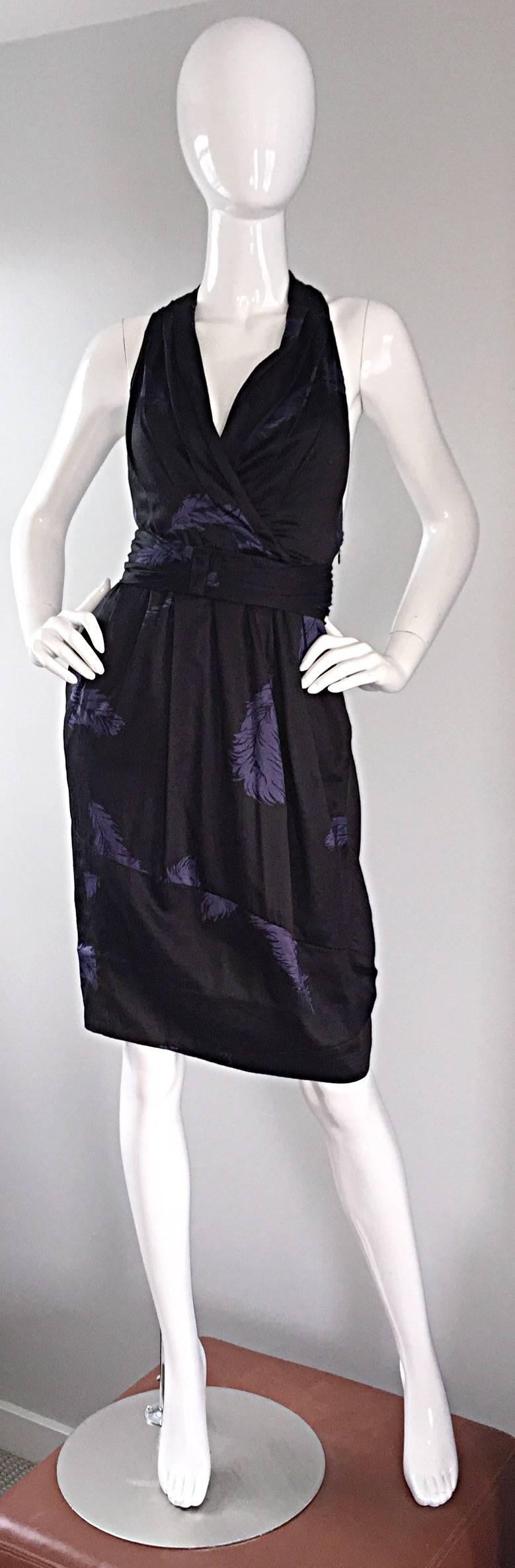 Utterly chic Marc Jacobs Collection (Main/High Line) dress! Features purple peacock feathers printed throughout. Soft black cotton. Racerback that wraps around the waist, with hook-and-eye closures (at waist), that form a cummerbund. Full bubble