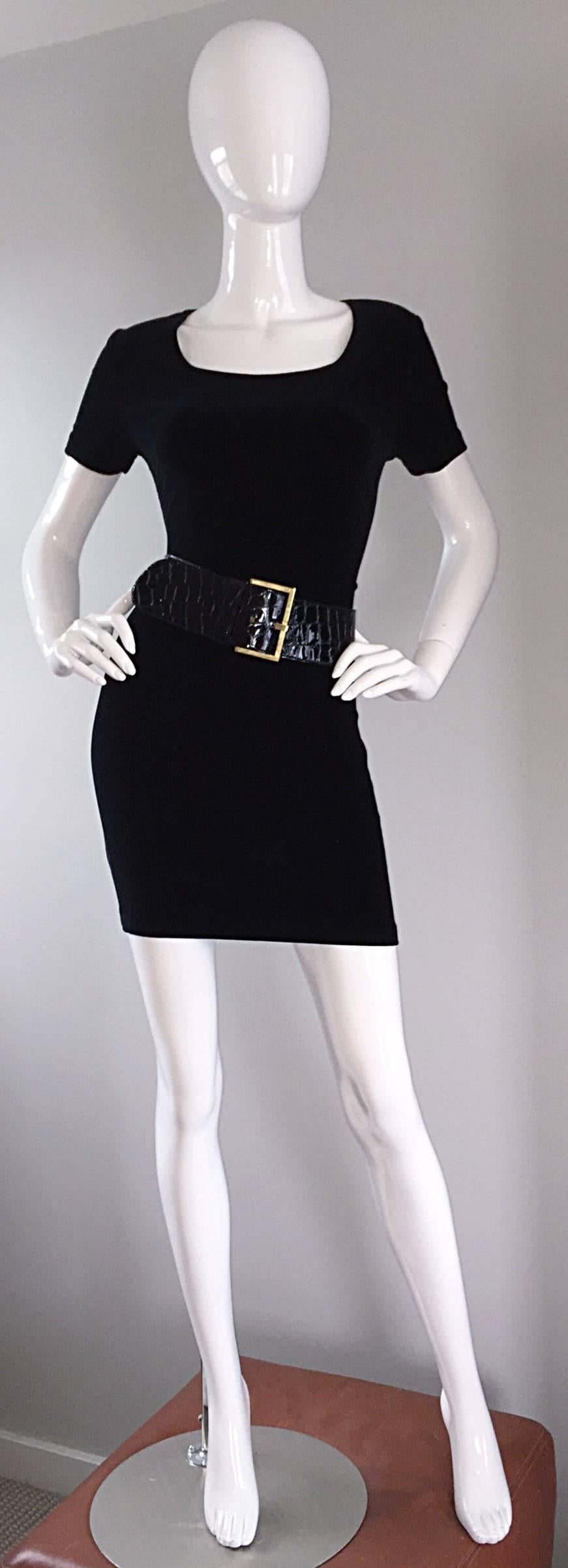 Brand new vintage Jane August gator embossed black patent leather belt! Substantial width, that makes just the right statement. Oversized square gold buckle. The perfect black belt for jeans, a skirt, or over your favorite little black dress. The