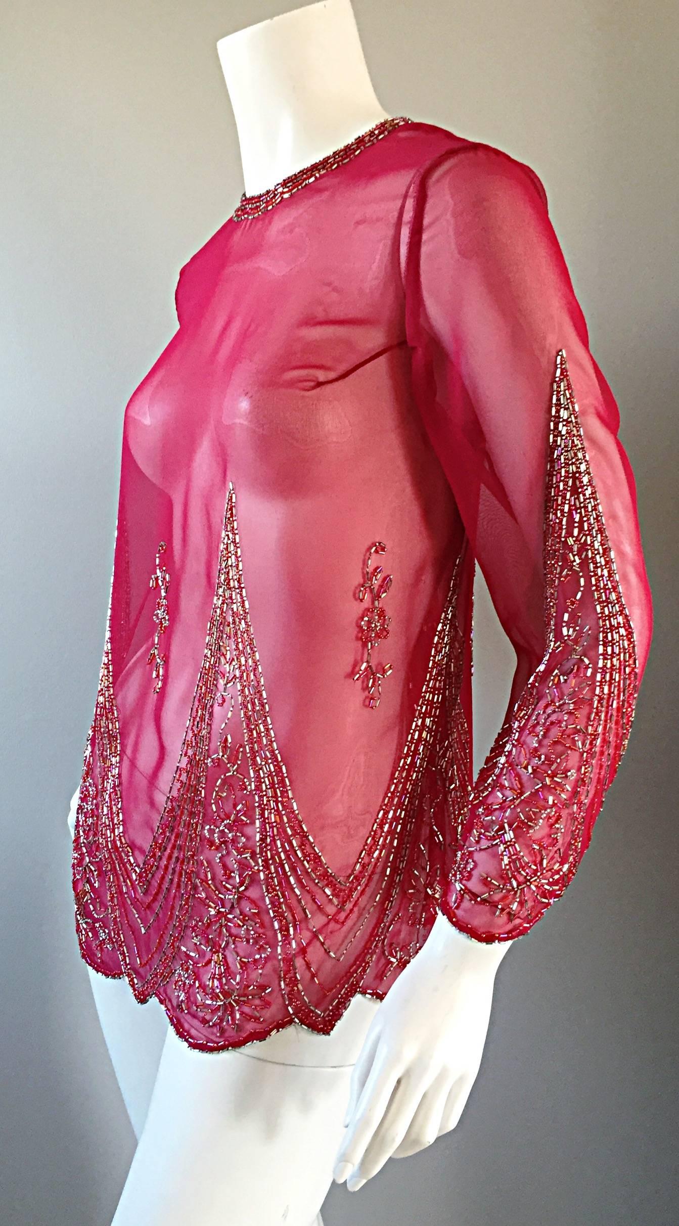 Beautiful vintage chiffon beaded tunic blouse! Stunning raspberry pink color, encrusted with hundreds of glass beads throughout. Intricate detail, with outstanding workmanship! Perfect over a tank, bra, or swimsuit. Can easily transition from day to