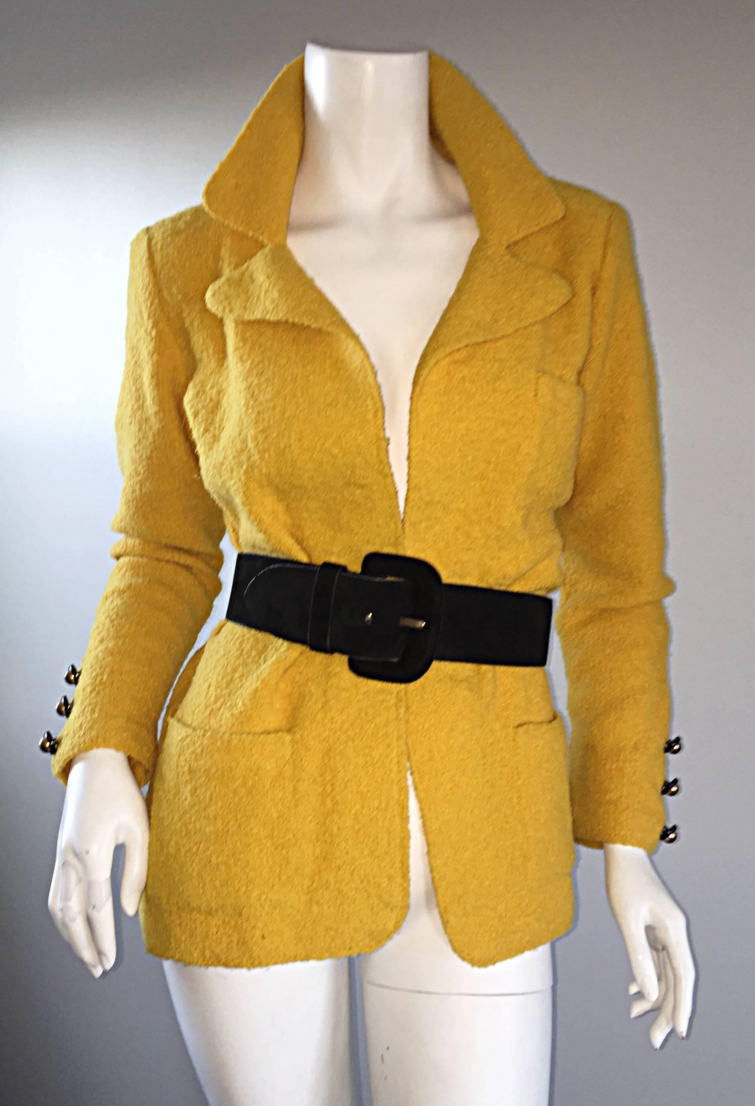 Excellent vintage Adolfo mustard yellow knit blazer jacket! Open front style, with three statement buttons at each cuff. Curved lapels, that add just the right amount of femininity. Features two pockets at both sides of waist, and one at left