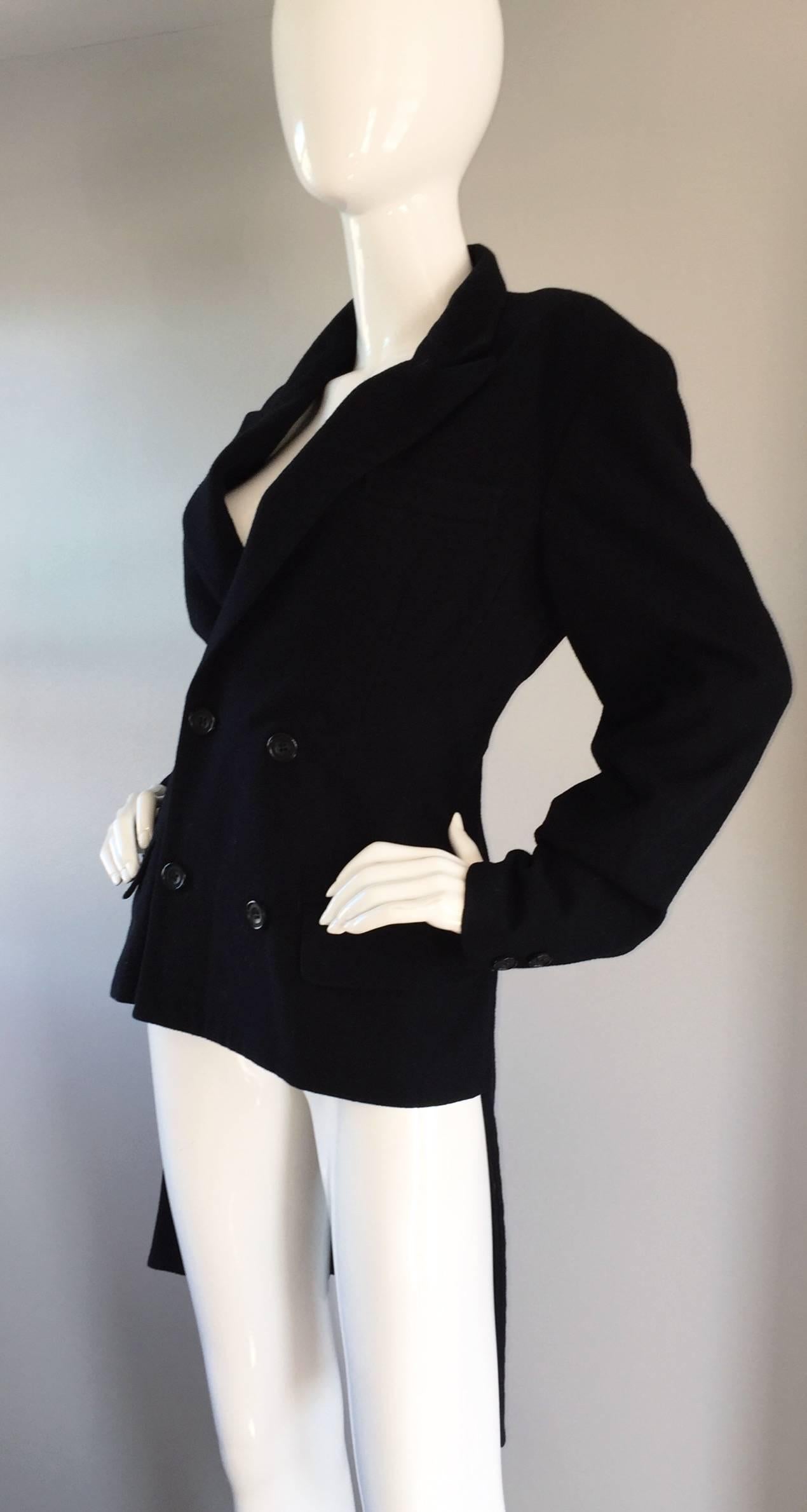 Super rare, and quite impressive early Yohji Yamamoto black wool blazer! Features a 'carwash' hem on the back. Double breasted style, that takes a step above the rest! Absolute impeccable construction, by an award winning designer. Your perfect new