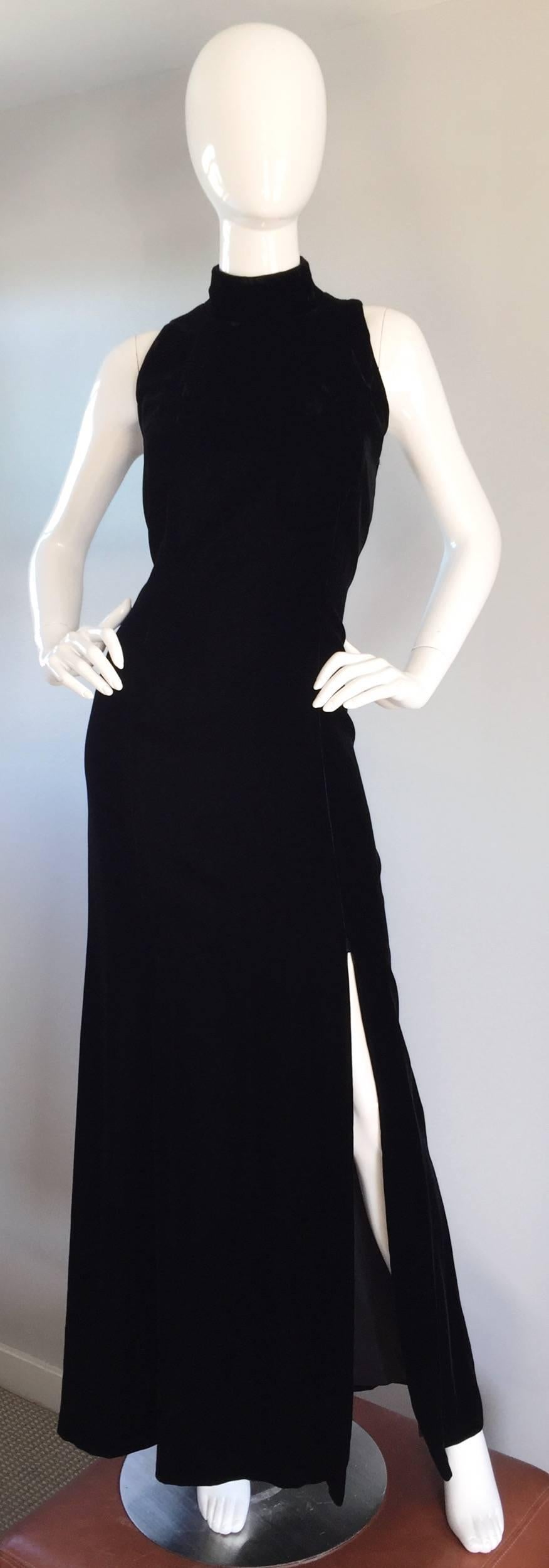 Stunning vintage Scaasi black velvet evening gown! Brilliantly constructed to elongate and slim the frame. Softest jet black velvet, featuring a high neck, and slit at the side left hem. So much more that just another black gown...This Scassi number