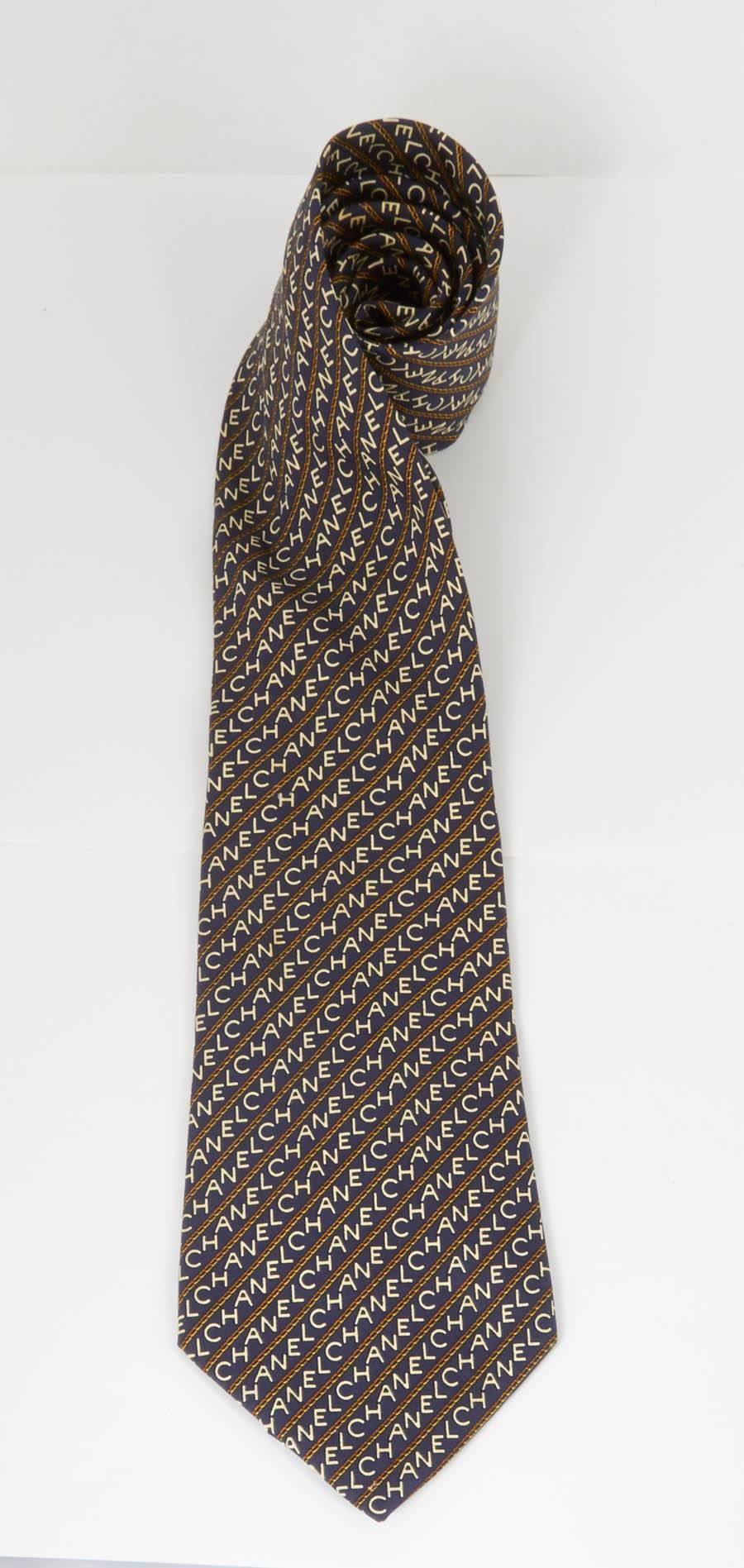 Very chic, rare Chanel black men's tie with Chanel logos. 