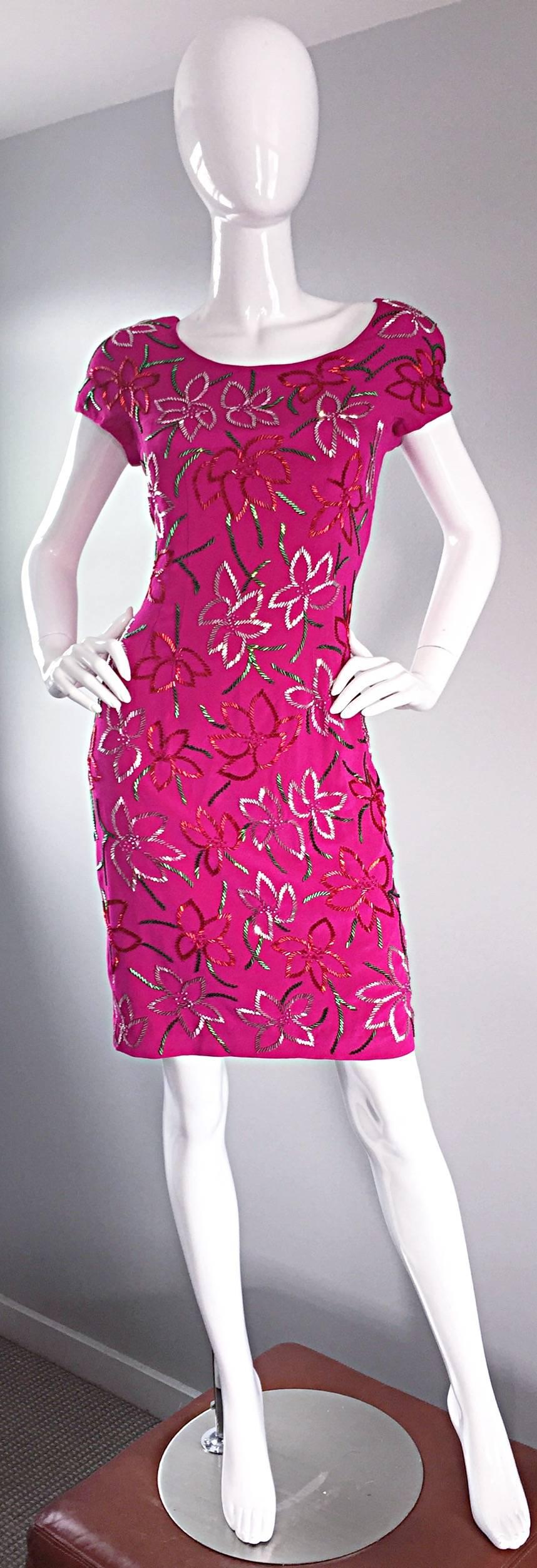 Wonderful in every aspect! Early 1990s CARMEN MARC VALVO hot pink silk dress! Encrusted with thousands of glass beads in red, green, silver, and pink, that form a tropical floral print throughout. Fantastic shape, that flatters the body in a
