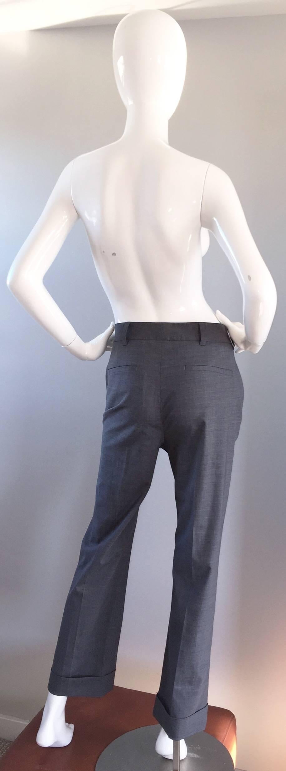 

Wardrobe staple Reed Krakoff light gray cropped pants! Lightweight wool, with an amazing fit---not too slouchy, yet not too fitted...Just PERFECT! Wide cuff at hem. Utilitarian feminine in all the right ways. Pockets at both sides of waist. Can