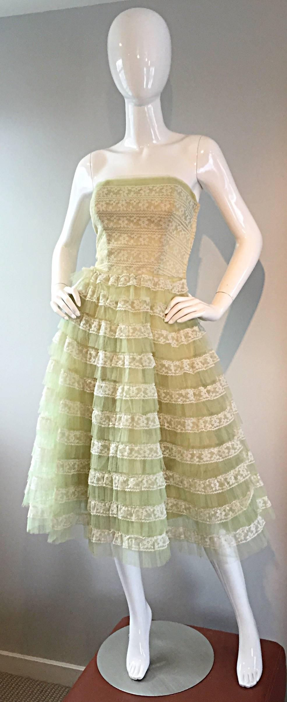Prettiest 1950s strapless light green dress! Layers and layers of floral lace, with a full skirt (built in crinoline under skirt). Wonderful construction, with a full metal zipper up the side bodice, with hook-and-eye closure. Such a beautiful mid