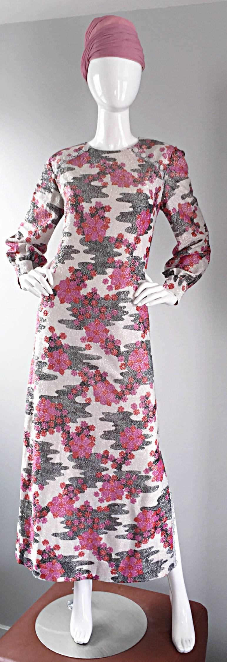 Absolutely amazing late 60s BALMAIN trapeze dress! Couture quality with an expert eye to detail. Silver silk metallic, with an Op-Art pink and gray camouflage print, with Cherry blossoms. Mock silver silk covered buttons at shoulder. Function silver