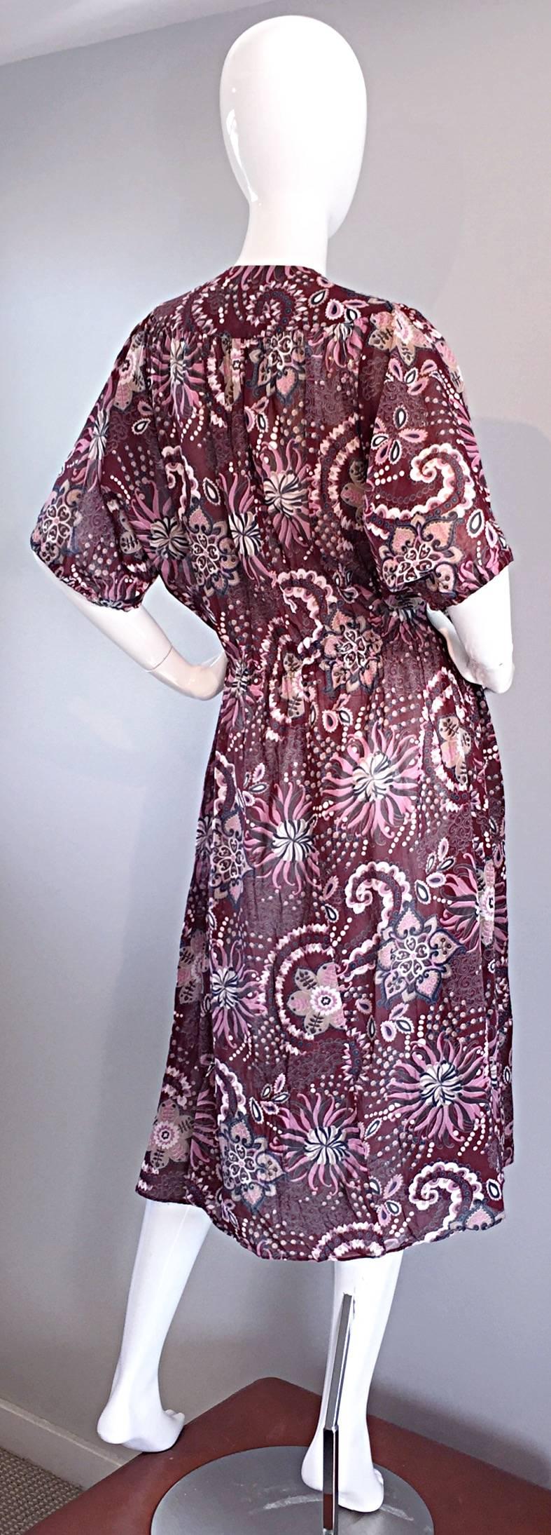 Amazing vintage boho dress! Silk/Cotton blend, that not only feels great, but looks AMAZING on! Wonderful op-art print. 1970s does 1940s with this wonderful silhouette! Perfect for a day or night event. Great belted, or alone, with wedges, strappy