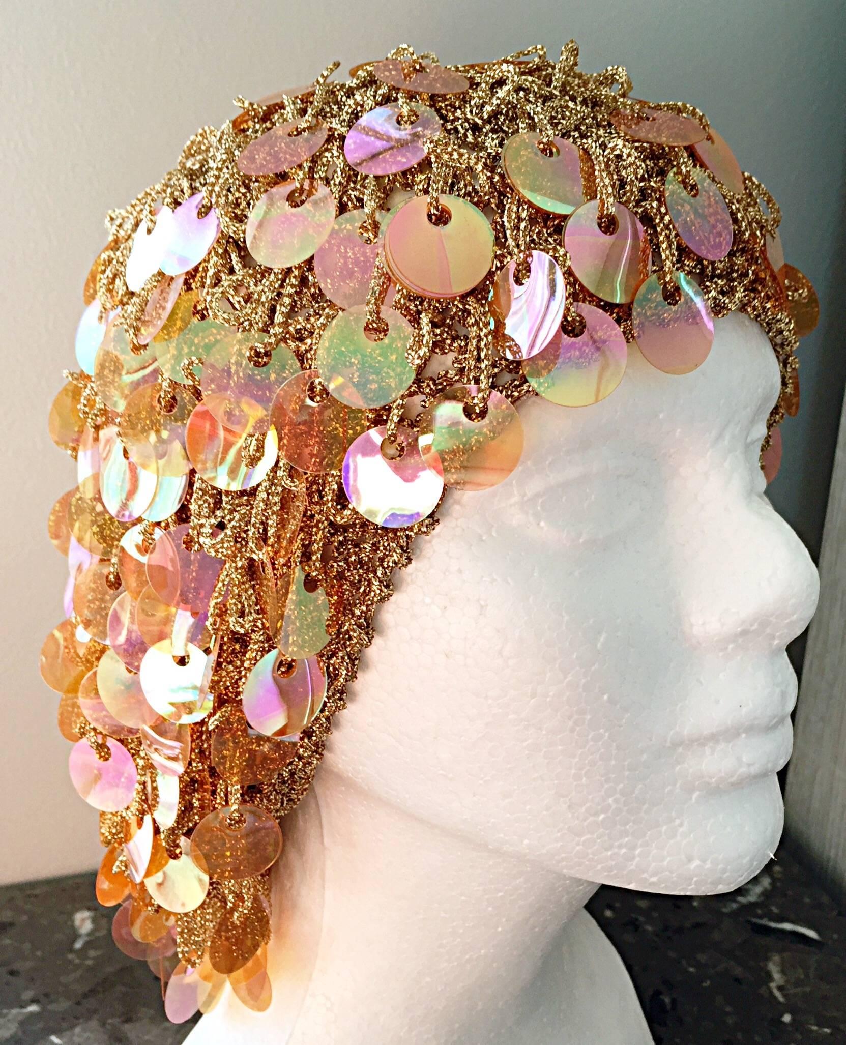 Incredible vintage 70s hat! Encrusted with hundreds of metallic paillettes throughout. All hand made in Italy. Gold metallic threading. Looks amazing on! Can easily be worn casually, or dressed up. Great with jeans, shorts, or a dress. In great,