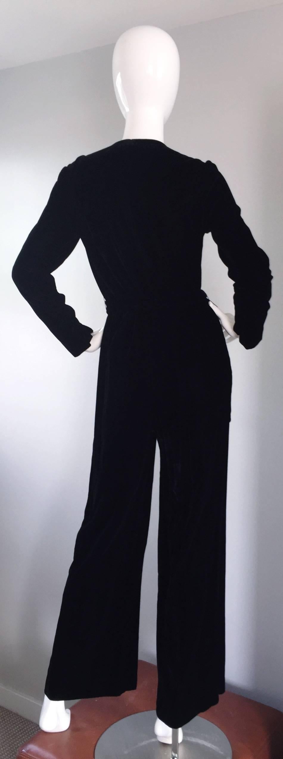 Incredible vintage MARY QUANT black velvet jumpsuit / catsuit! Features a luxurious, soft velvet, with a functional full metal zipper that leads up the front, all the way to the neck (you can control the amount of cleavage). Also, has original