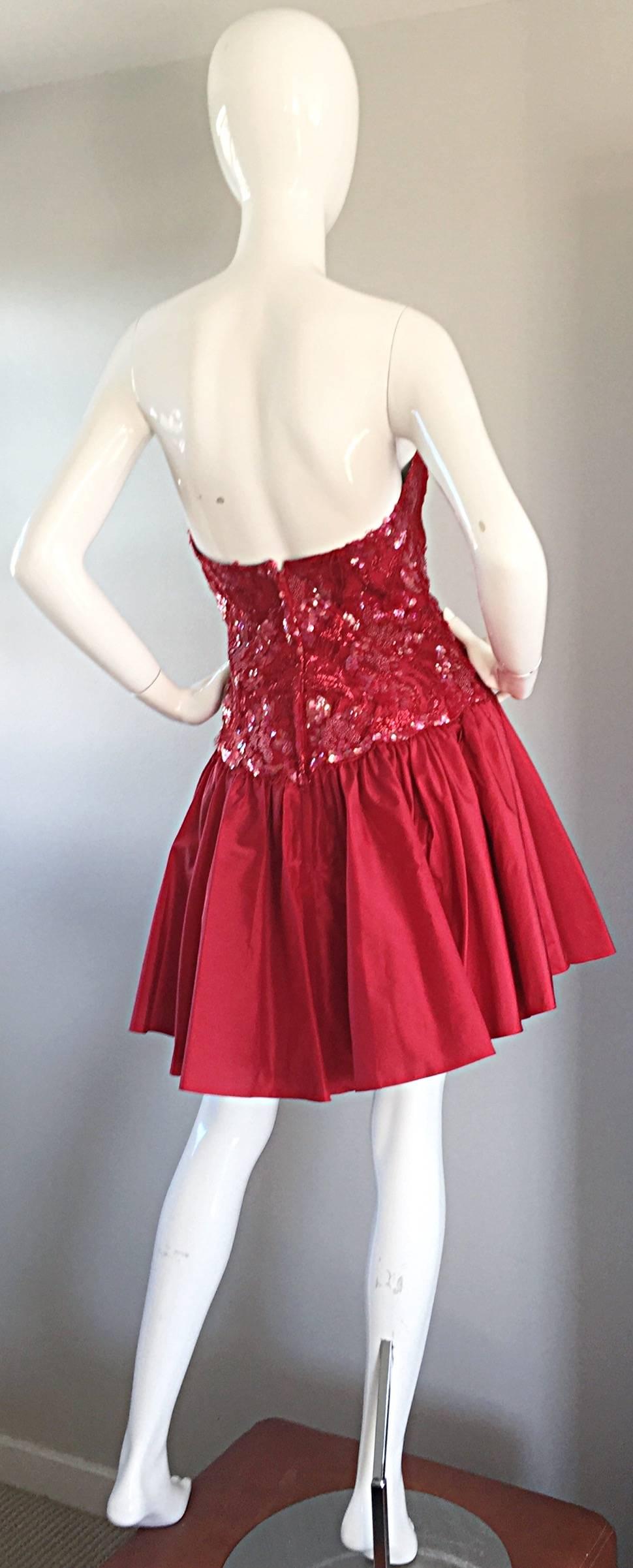 Absolutely beautiful vintage JOANNA MASTROIANNI candy apple red silk dress! Strapless bodice, encrusted with thousands of hand-sewn sequins and beads throughout. Couture quality, with a built in crinoline for a full skirt. Perfect all year, yet