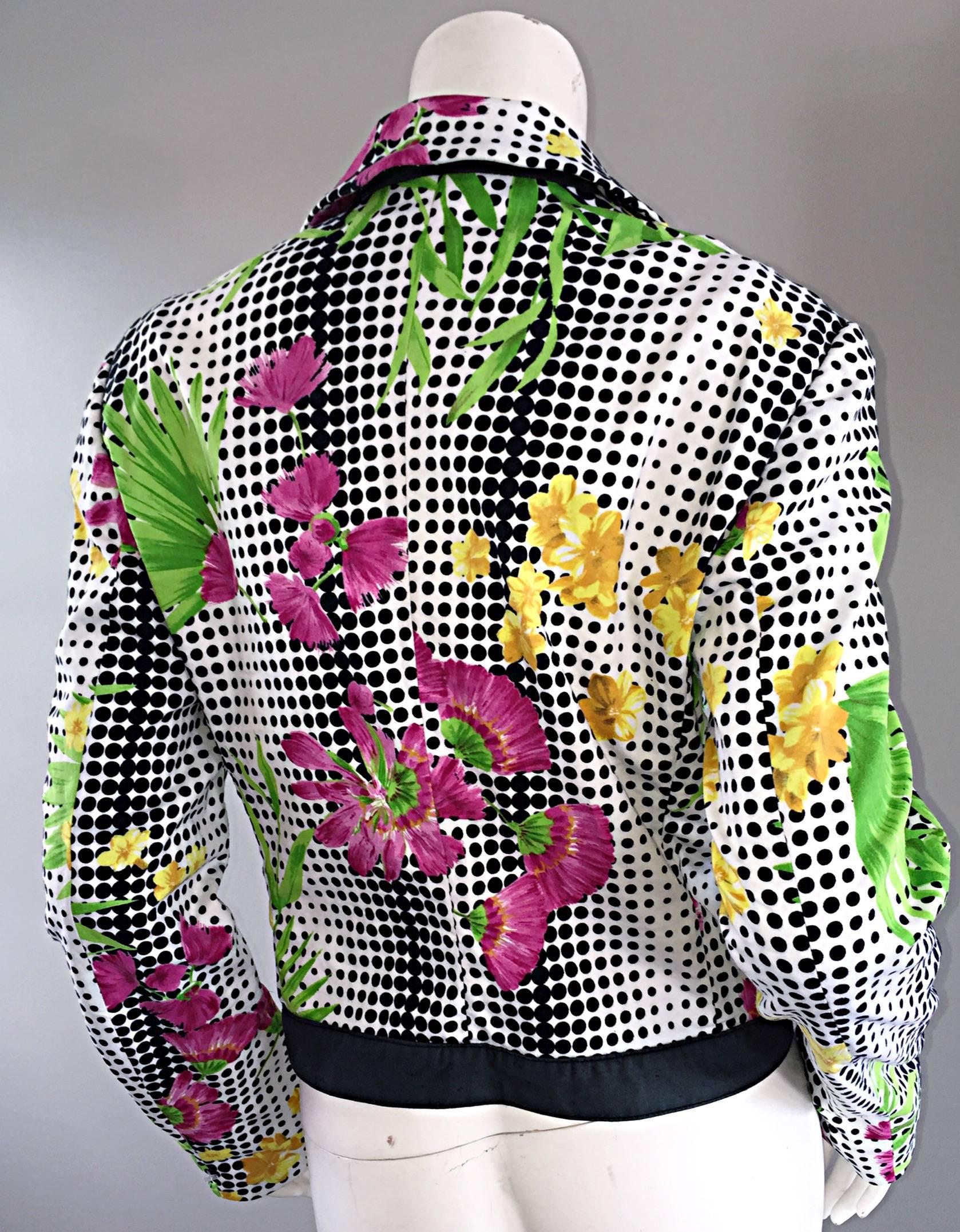 Important, and super rare vintage 90s GIANNI VERSACE Jeans Couture fitted op-art geo floral printed jacket! Amazing fit, with an equally impressive signature Versace print. Attached belt, with silver round buckle at waist center. Signature silver