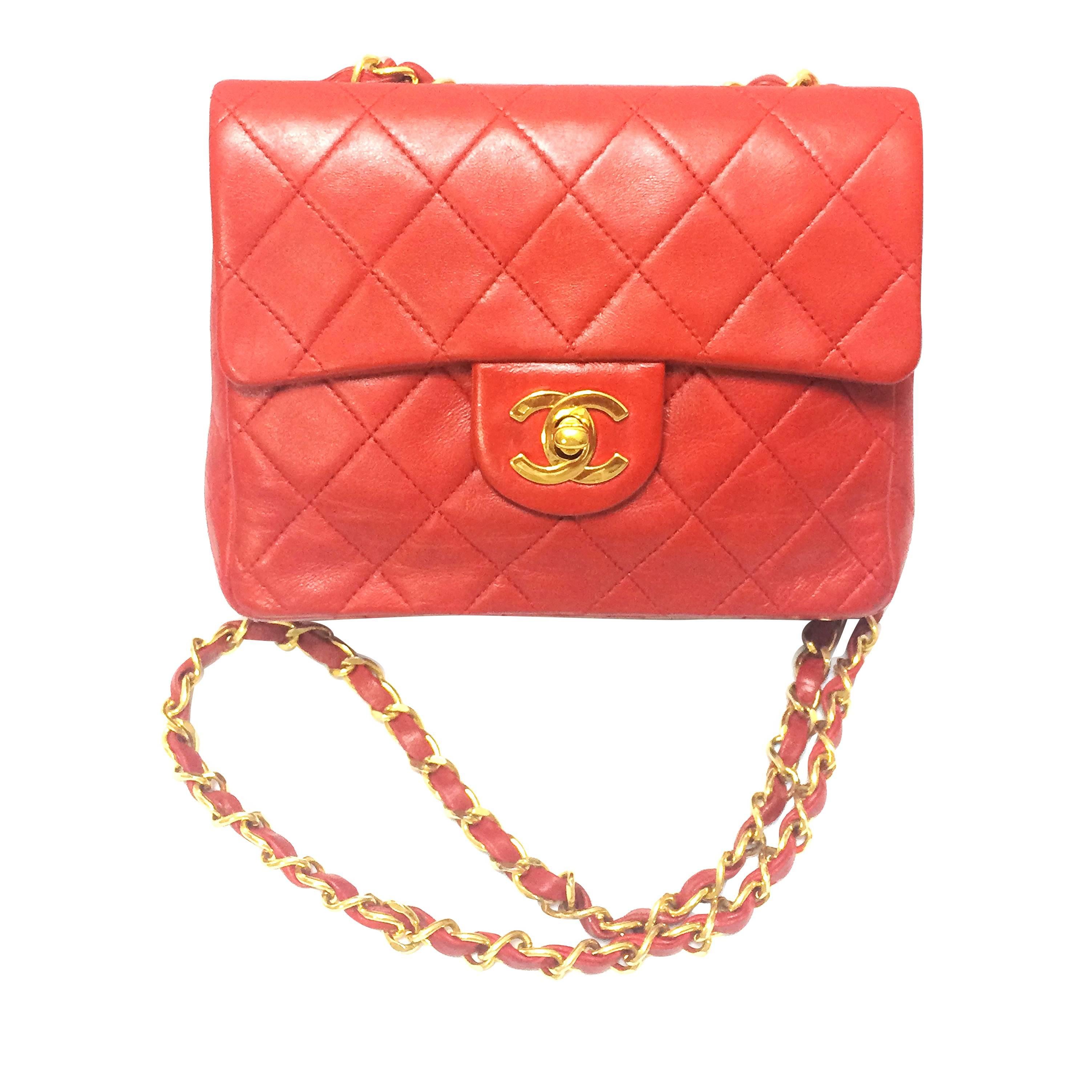 Vintage CHANEL lipstick red lambskin purse with golden CC and chain strap.