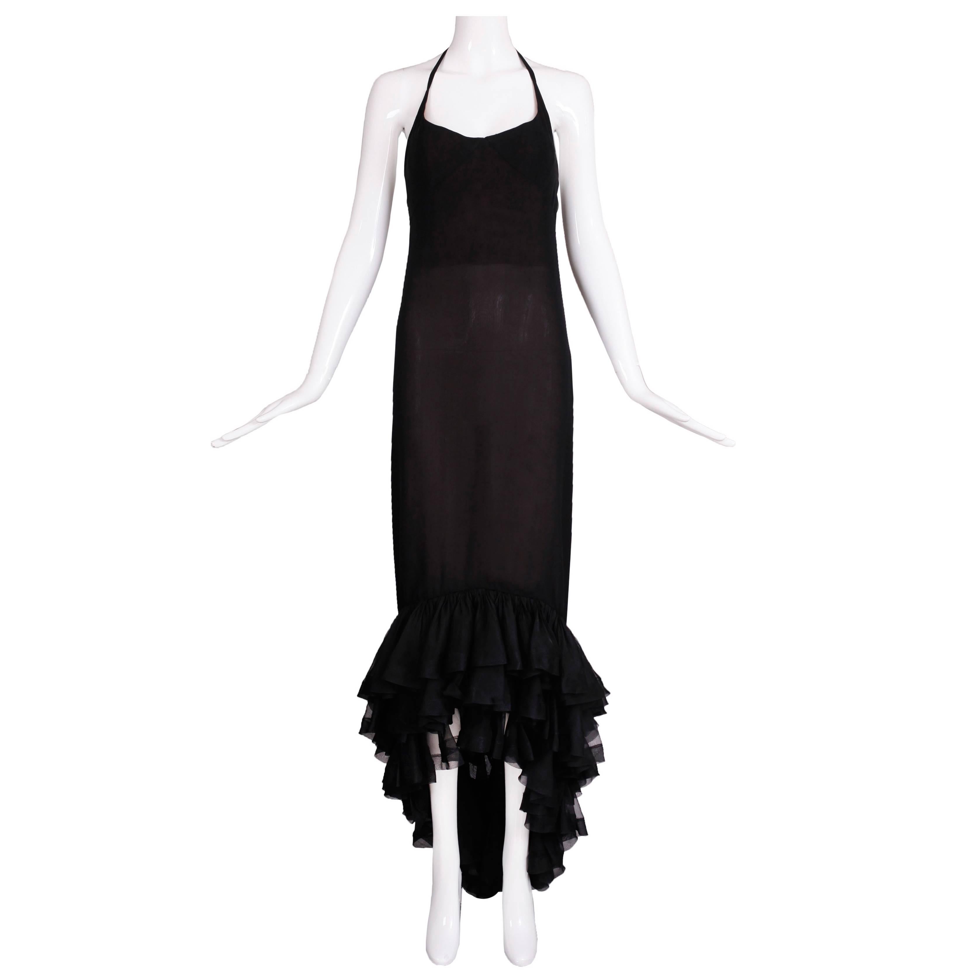 Vintage Pierre Balmain haute couture No. 173.195 black silk chiffon halter neck evening gown with ties at the back neck, a high-low ruffled hemline, an interior silk bustier w/boning and an additional layer of nude-colored silk chiffon lining the