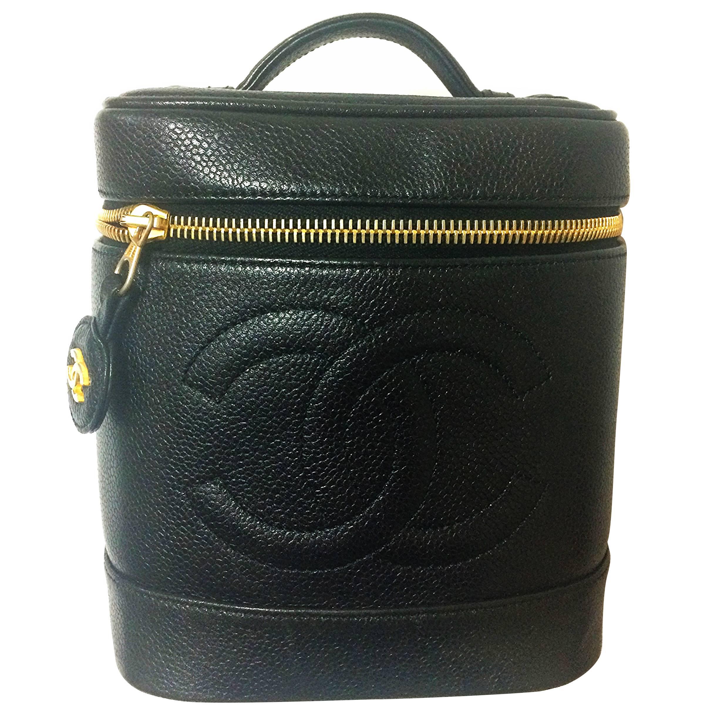 Vintage CHANEL black caviar cosmetic and toiletry mini bag, party vanity bag.