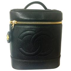 Retro CHANEL black caviar cosmetic and toiletry mini bag, party vanity bag.