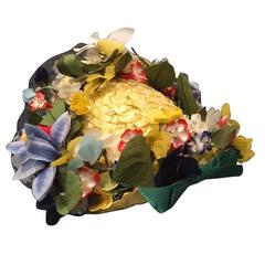 1950s Chanda Pale Yellow Straw Hat Trimmed in Beautiful Multicolor Flowers