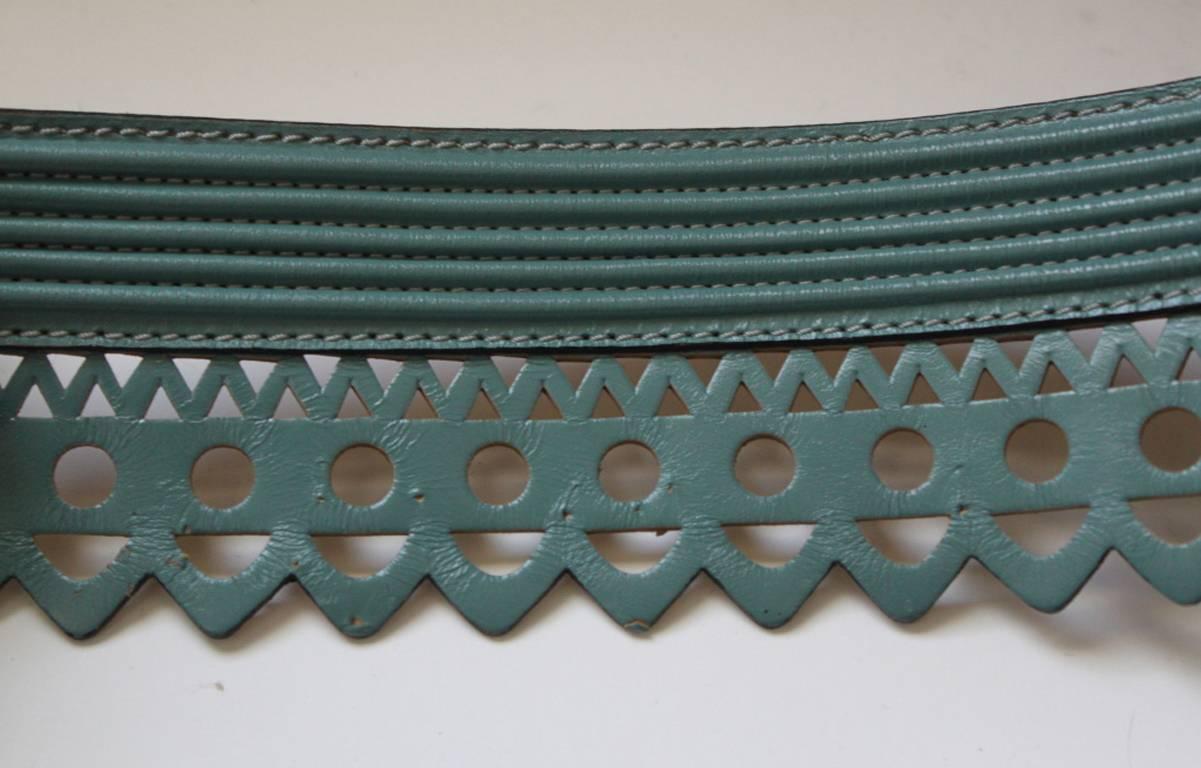 Teal scalloped leather laser cut belt from Azzedine Alaia dating to spring/summer of 1992. Size 75. Made in France. Very good condition. 