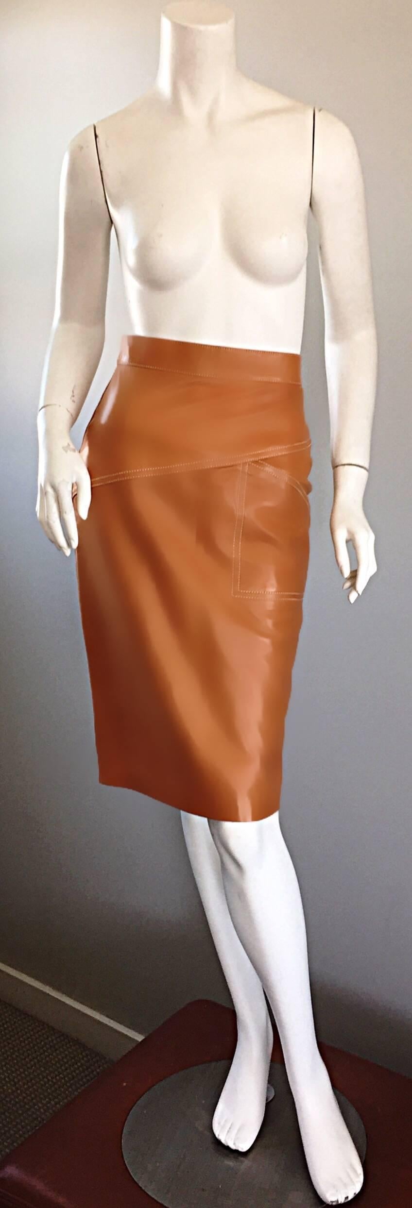 The perfect vintage ESCADA by MARGARETHA LEY high waisted leather pencil skirt! Incredible rich saddle tan color is perfect all year, and is super versatile. This color matches with ANY color! Luxurious soft butter leather feels amazing against the