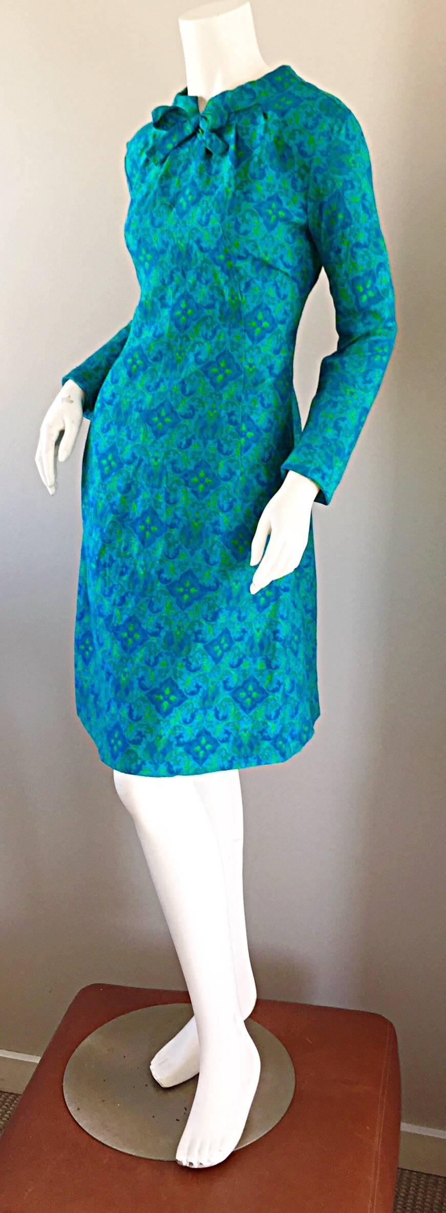 Charming vintage YEN YEN OF MALAYA 1960S teal blue and lime green paisley and brocade print silk A-Line dress! I have had the pleasure of owning a handful of dresses by this sought after 60s label, and this one is nothing less than perfect! Amazing
