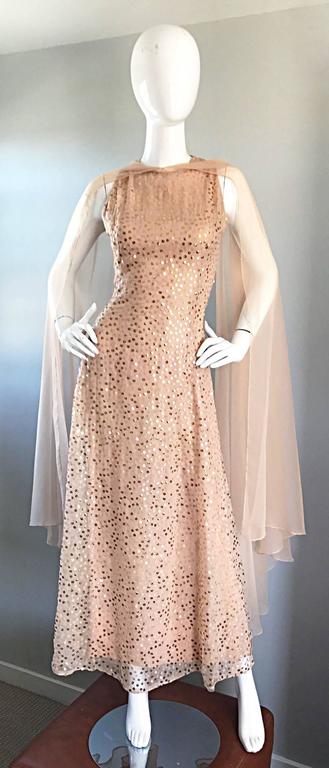 1960s PAT SANDLER nude silk chiffon and sequined evening dress with attached cape! Features hundreds of hand sewn gold and silver sequins throughout. Cape can be worn multiple ways, and has hidden hook-and-eye closure in the front. Full metal zipper