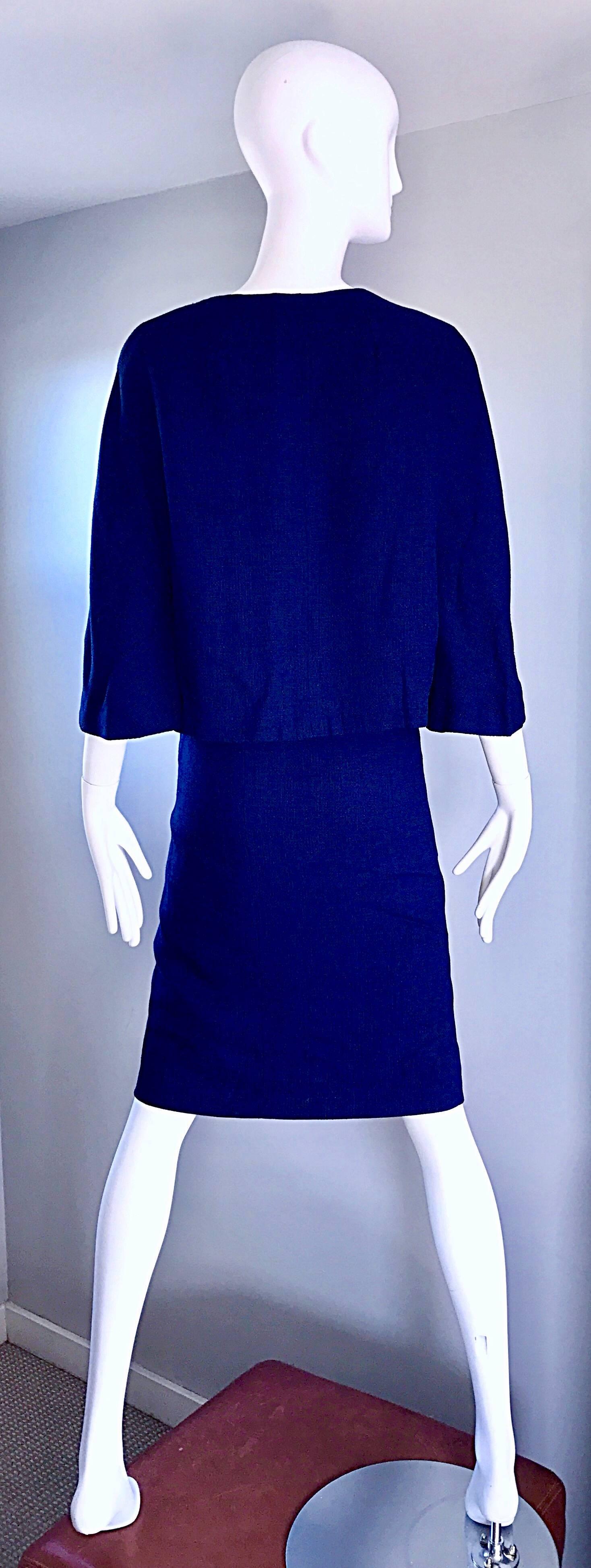 Chic vintage 1960s LILLI ANN navy midnight blue wool skirt and matching jacket! Features soft wool, with a signature Lilli Ann design. High waisted pencil skirt features a metal zipper up the back, and hook-and-eye closure. Tailored pillbox jacket