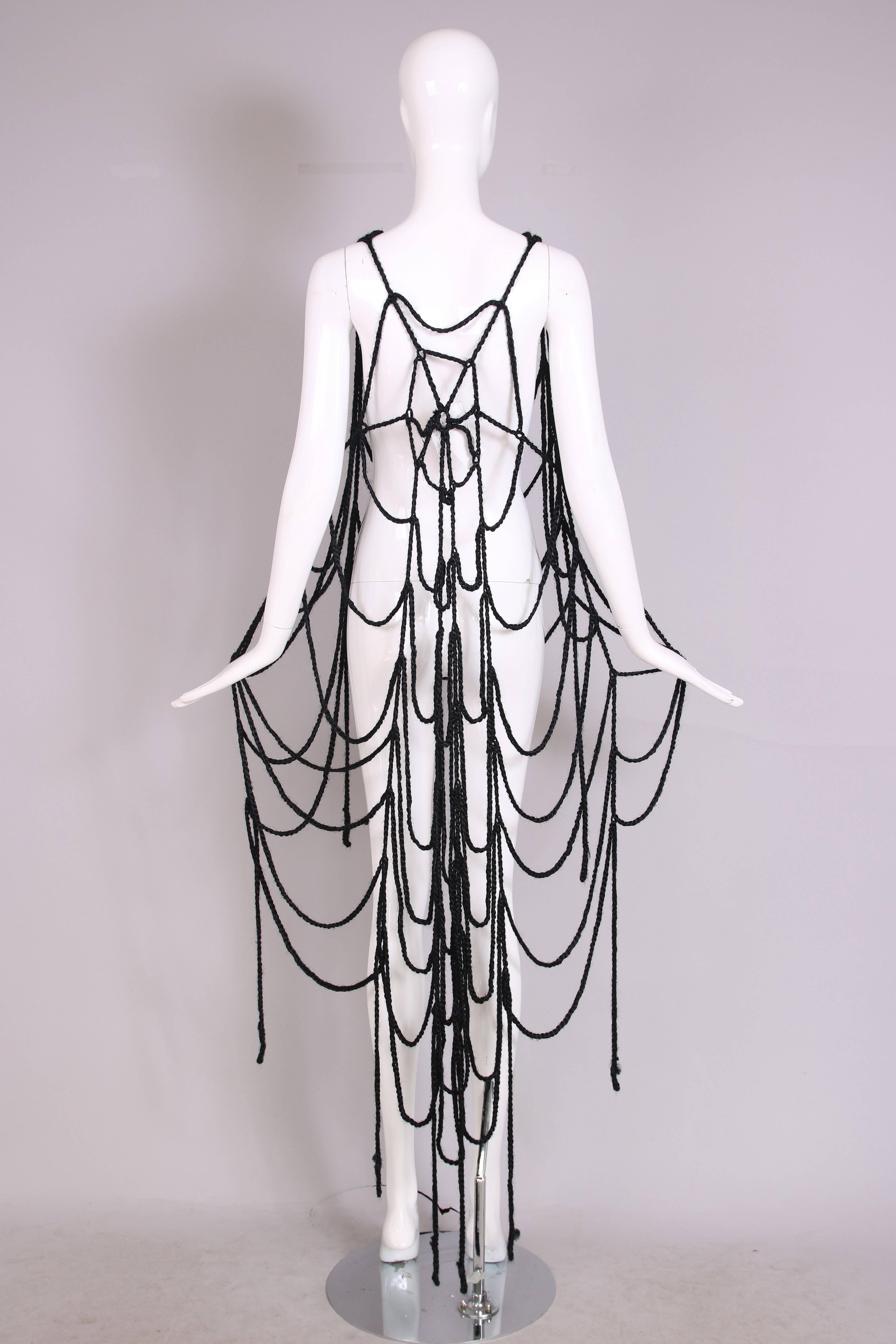 Maison Margiela black wool spider web scarf made up of strands of braided yarn in a spider web design at back. In excellent condition.
