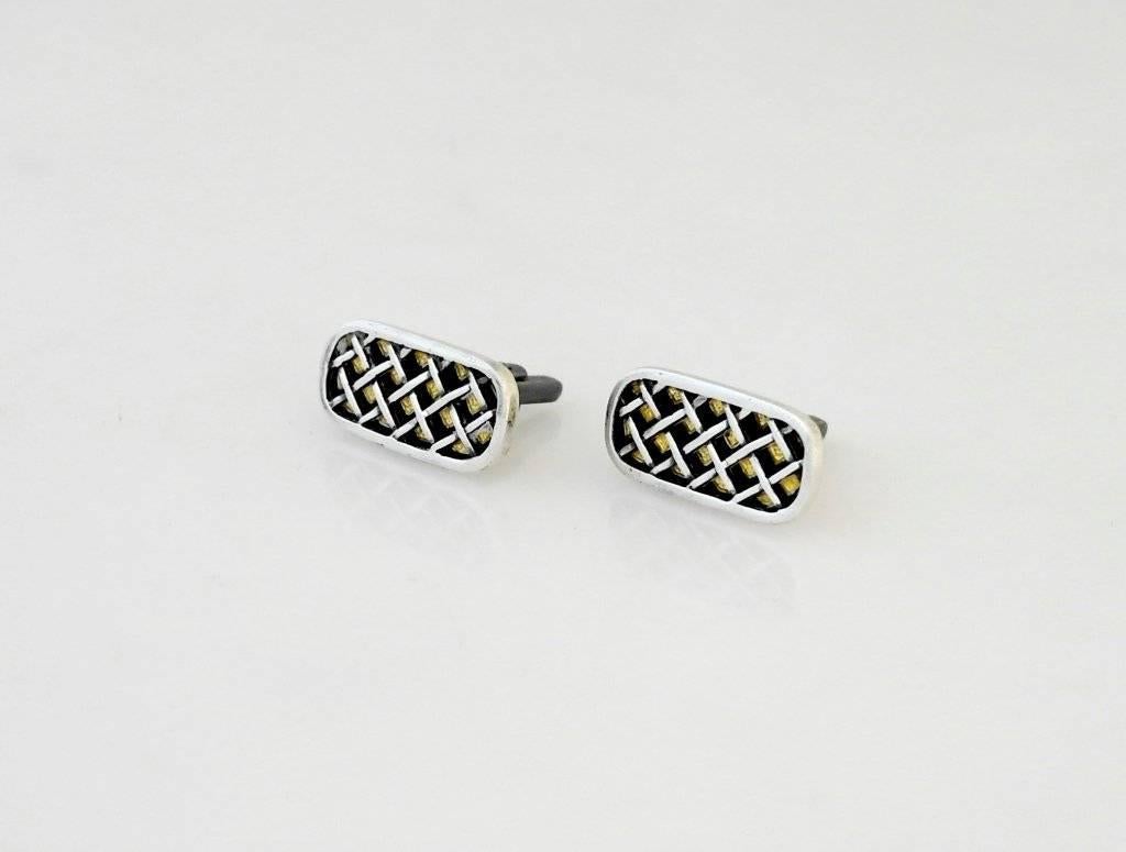 Being offered are a pair or rare 1965 Margot De Taxco sterling silver modernist enamel cufflinks, #5473, in a weave pattern with yellow and black enamel.  Applied strips of silver create the individual sections of enamel and add a dimensional