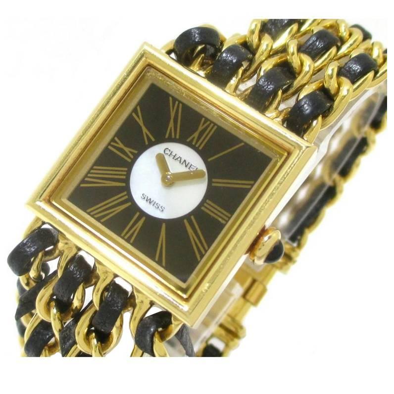 80's Vintage CHANEL golden chain and black leather wrist watch. K18 Yellow gold. For Sale
